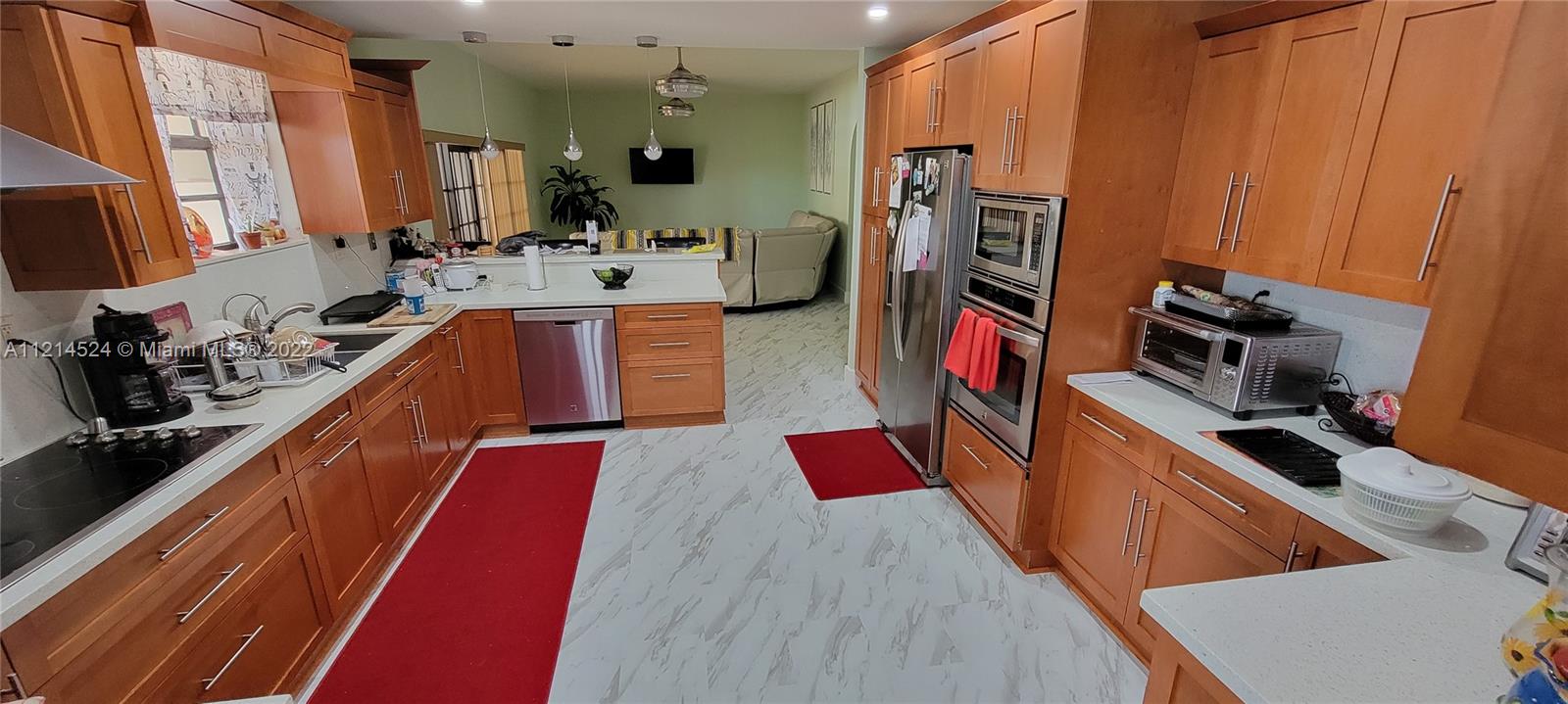 Kitchen: view to snack counter and family room