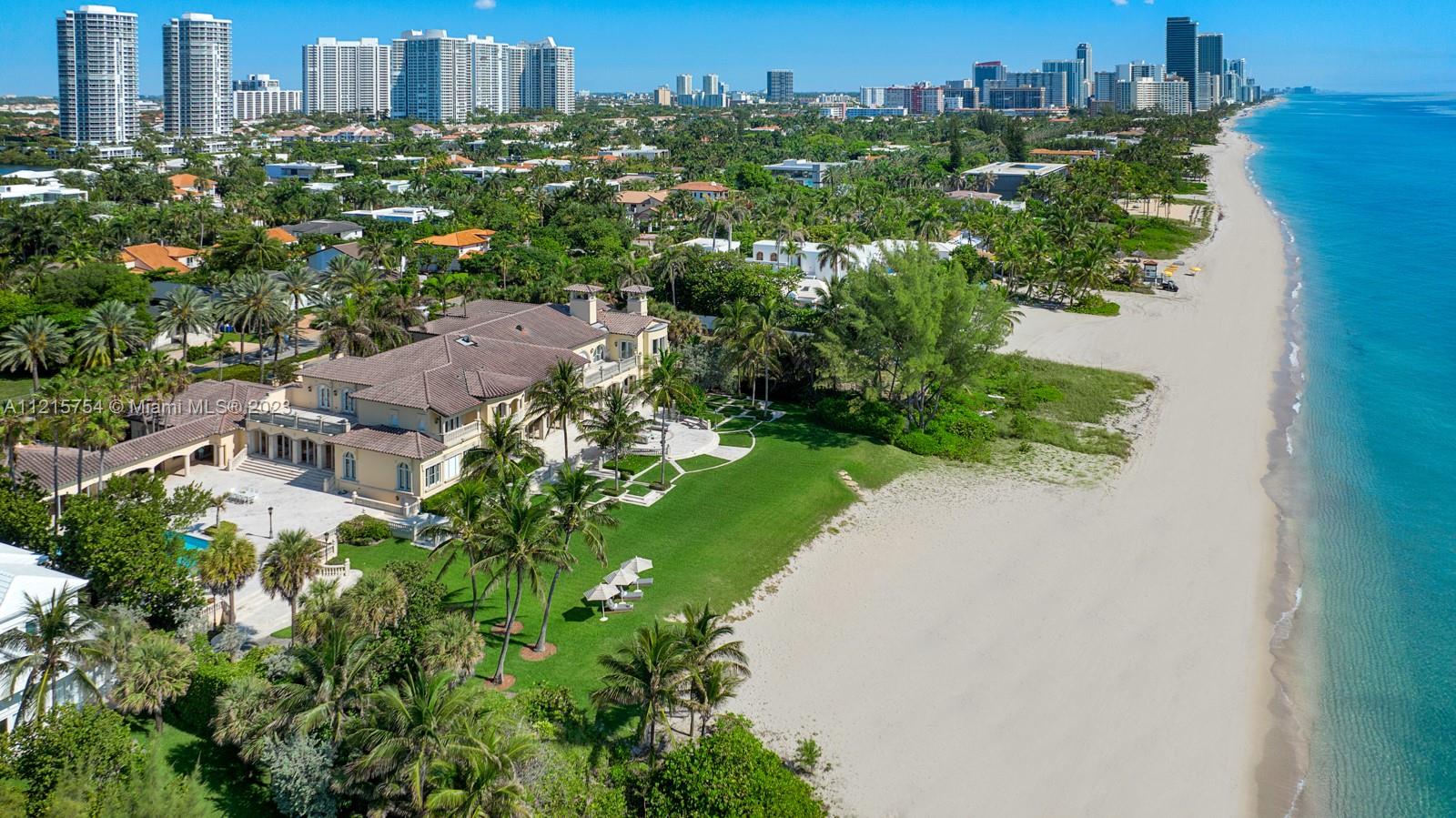 A Compound on the sands of Golden Beach princely positioned for the privacy seeker. With 250 linear feet of ocean frontage and 1.5 acres, this mega estate is the largest oceanfront property in Miami. Decorator ready with plans and permits in process for a 10 bedroom, 3 staff room, 6 car garage, 30,000SF+ Mansion. With 5 bedrooms facing the ocean, along with all key living areas and 11ft - 23ft ceilings throughout, the spacial planning was light years ahead. Seaside breezes are appreciated from the loggia, poolside cabana, 58ft swimming pool, grand veranda, and a swoon-worthy green lawn. On the market for the first time in nearly 40 years, this one-of-one trophy exudes Palm Beach elegance amidst Golden Beach’s prized amenities: private beach, tennis courts, clubhouse & its own police force.