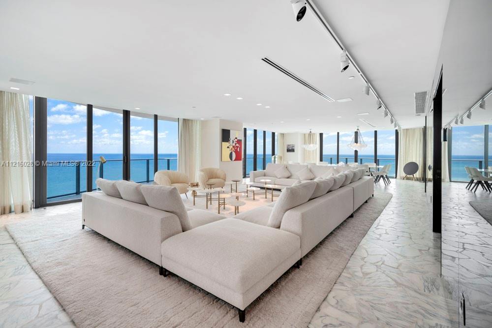 Enjoy 360 degrees of unobstructed views. This 4,992 square foot marvel in the sky boasts Atlantic Ocean and sunrise and sunset views that will take your breath away. With only one residence per floor a wraparound balcony spans the entire 17th floor while 4 BR, 5+1BA, a custom gourmet kitchen and an open floorplan living and dining room area exude luxury in every corner. The living spaces feature seamless 10 ft floor-to-ceiling glass walls & sensational views of the Atlantic Ocean, Golden Beach, & skylines of Miami. Every room offers views and balcony access while the principal suite boasts dual rain showers, sinks and closets. Regalia offers a concierge, full service spa, beach & pool, a private wine vault, business center, children's play room, library, yoga studio & fitness center.