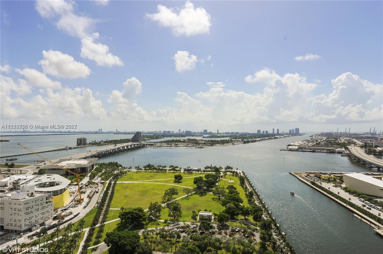 Enjoy spectacular, unobstructed direct views of Biscayne Bay & city from this bright 3/3 flow through apartment. Features include; private elevator entry,10 ft ceilings, marble floors throughout, beautiful open kitchen w/Italian cabinetry, Miele & Subzero appliances, custom closets & 2 balconies. All bedrooms have access to 2 balconies. Assigned Parking #10036. Building offers: 2 pools, movie theater, fitness center/spa, 24-hour security, valet, concierge and doorman.