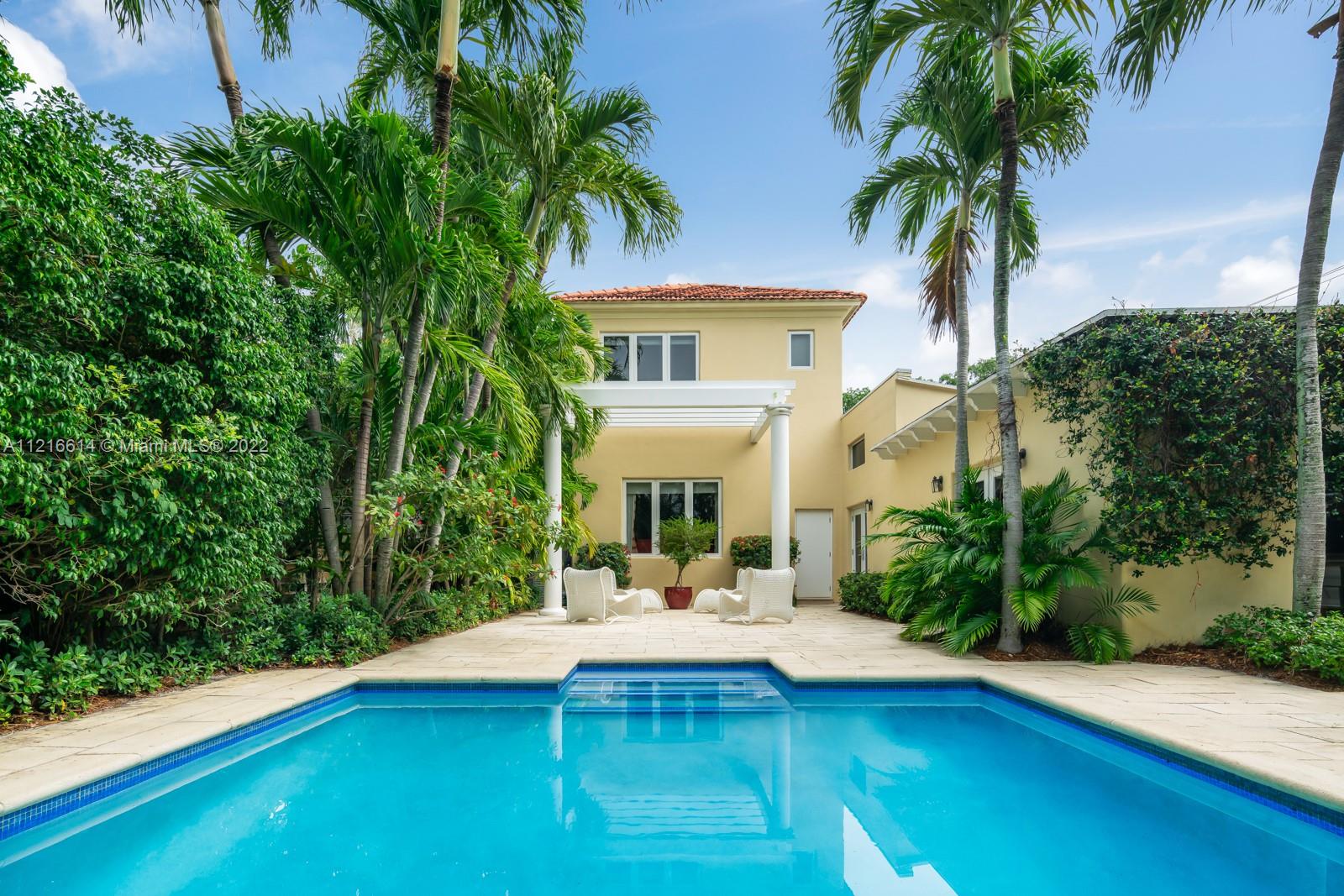 Contemporary elegance and timeless warmth in a beautiful wide tree-lined street. Living areas have exposed Dade county beam, Cathedral ceilings, custom built-ins throughout the house. Impact windows and doors. Absolute move-in condition.
