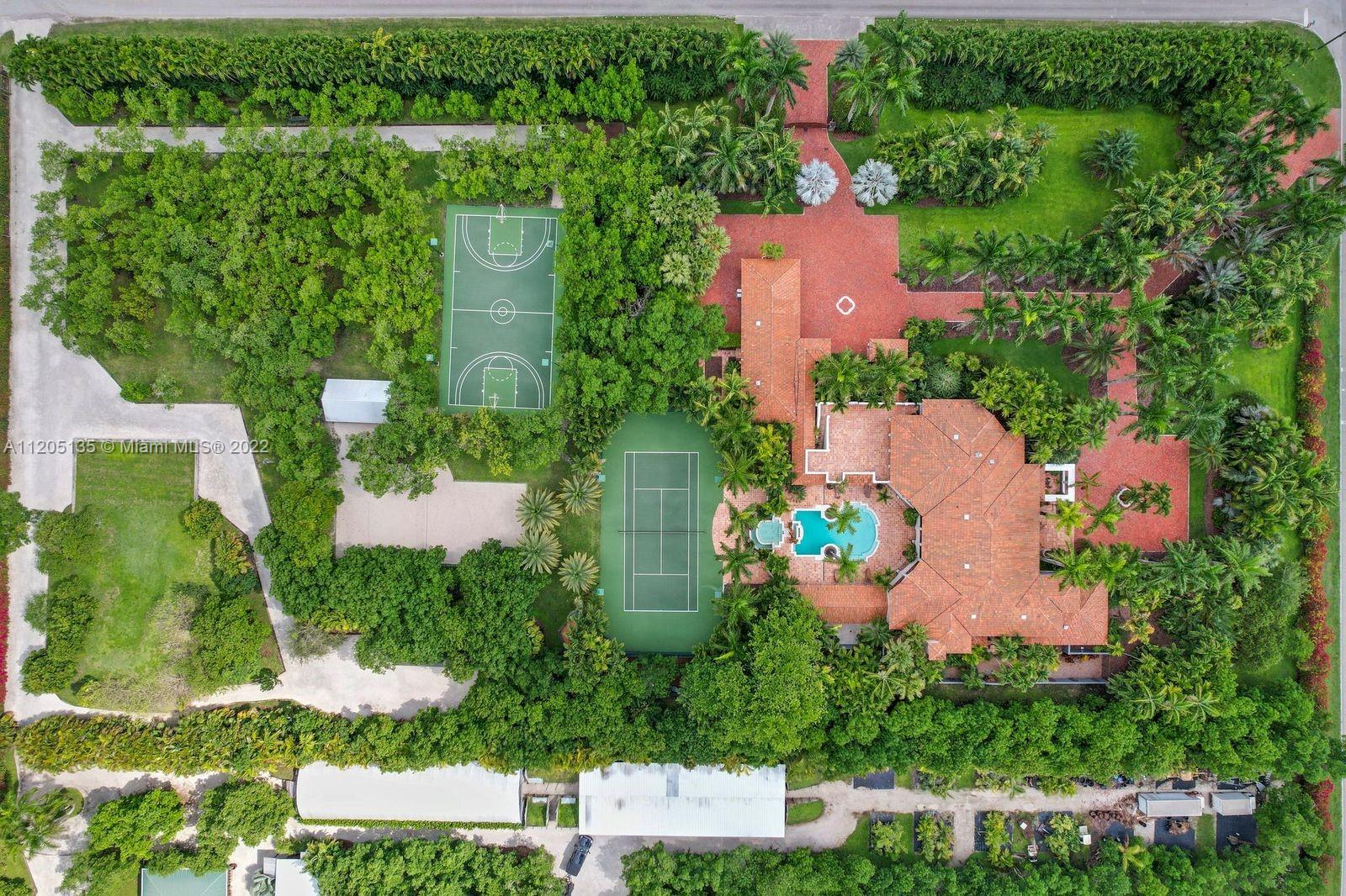 5 ACRES~ 23 ROOMS ~8 BEDS/7.5 BATHS~ 22,000 TOTAL sq. footage 12,000 UNDER AIR & 10,000 COVERED EXTERIORS ~CABANA W/ STEAM & SAUNA~10 FOOT DEEP POOL W RAIN CURTAIN ~GUEST HOUSE~3 CAR GARAGE~REGULATION BASKETBALL, TENNIS AND SAND VOLLEYBALL COURTS, COVERED BBQ 20'X32', LOADED COMMERCIAL SUMMER KITCHEN,ETC. THIS ESTATE IS IMPRESSIVE, ORGANIC AND LOW KEY.