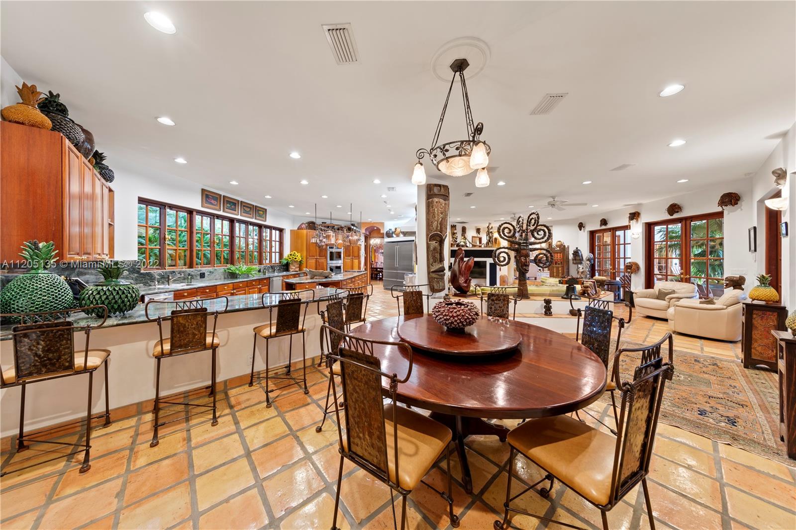 Super location for the kitchen table. Open a set of French doors n your in a large lanai that houses the summer kitchen. No event is too large or small as there is room for many chef's running 2 commercial kitchens within close proximity to one another. Separate yet together.