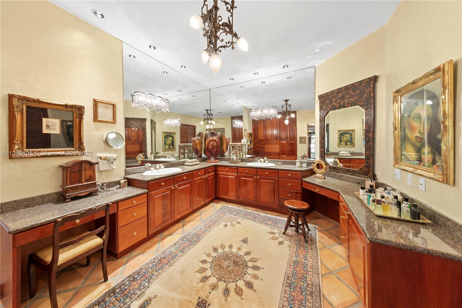 Main bath...Ideal layout for 2. The walk in closets and storage on 3rd level are unseen, however all have the mahogany built ins.