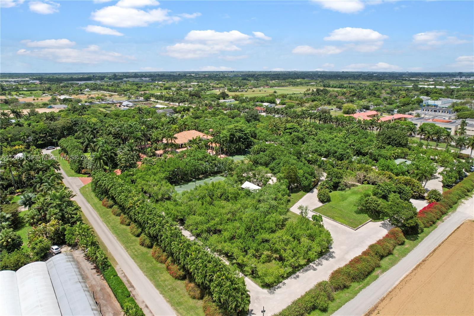 Multiple entrance to the estate. THE ADJACENT 5 ACRE PARCEL COULD BE AVAILABLE, BRINGING THE LAND SIZE TO 10 ACRES...