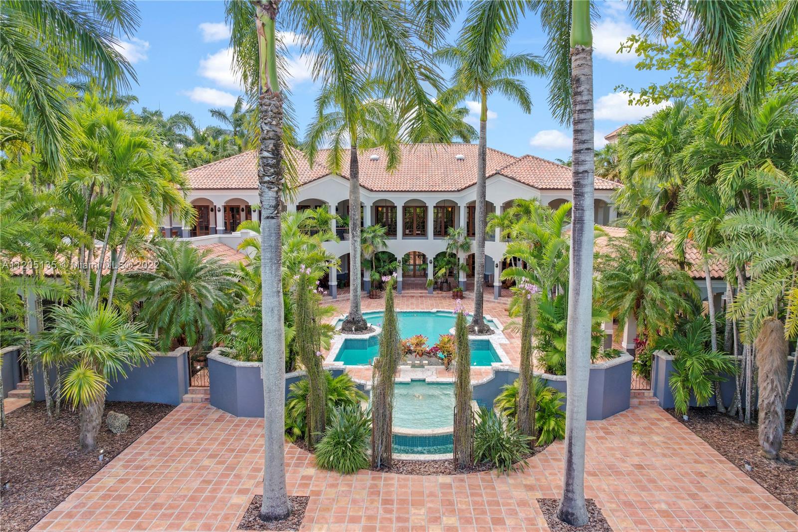 Resort level with multiple exterior gates, adorned with the estates signature the