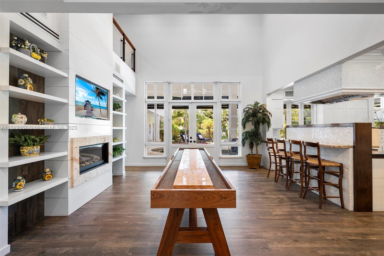 Living room w/20' high  beamed ceiling