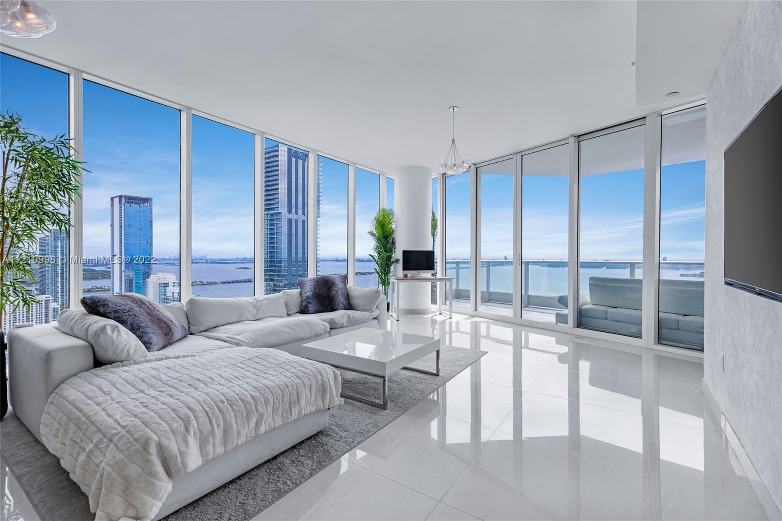 UNOBSTRUCTED ocean and Biscayne Bay views at the ultra luxury Paramount Bay. This gorgeous NE corner unit features 2 beds / 2.5 baths, private foyer with 2 elevators, split floor plan with private bathrooms, updated porcelain floors, brand new AC unit, designer light fixtures, private laundry room and more. Amenities designed by Lenny Kravitz include sunrise & sunset resort-style pools with private cabanas, yoga & Pilates studio, kids room, business center, party room, state-of-the-art gym facility & 6,000 sqft spa, valet services & 24-hour security. Centrally located in the heart of Edgewater across from Margaret Pace Park. Minutes away from Downtown, Brickell, Midtown, Wynwood, Miami Beach & MIA international airport. Virtual 3D tour is available. A must see!