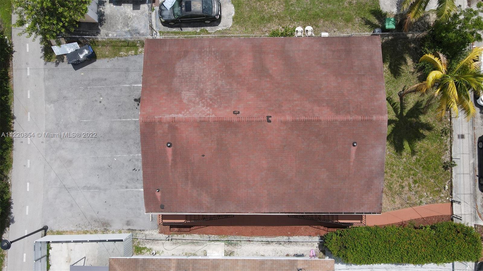EXCELLENT ROOF CONDITION. BACK OF THE PROPERTY ITS AN ALLEY.