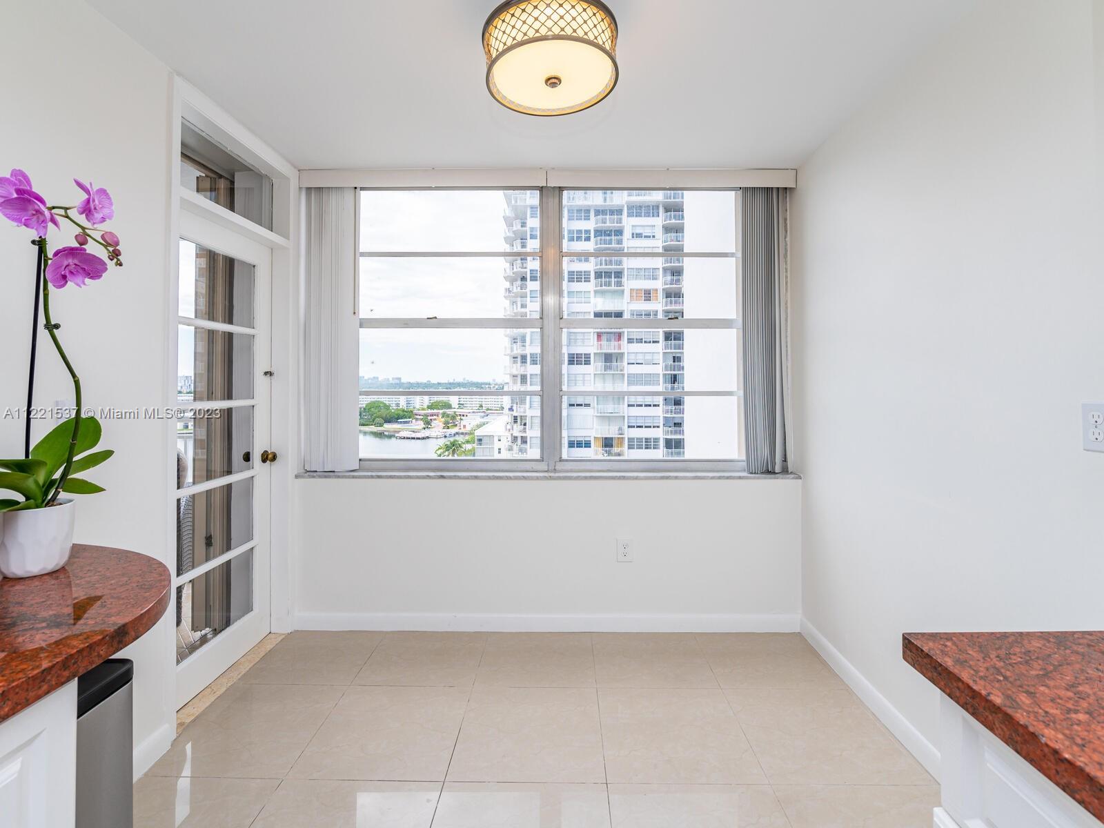 Dine-in kitchen with a great view and access to the balcony.