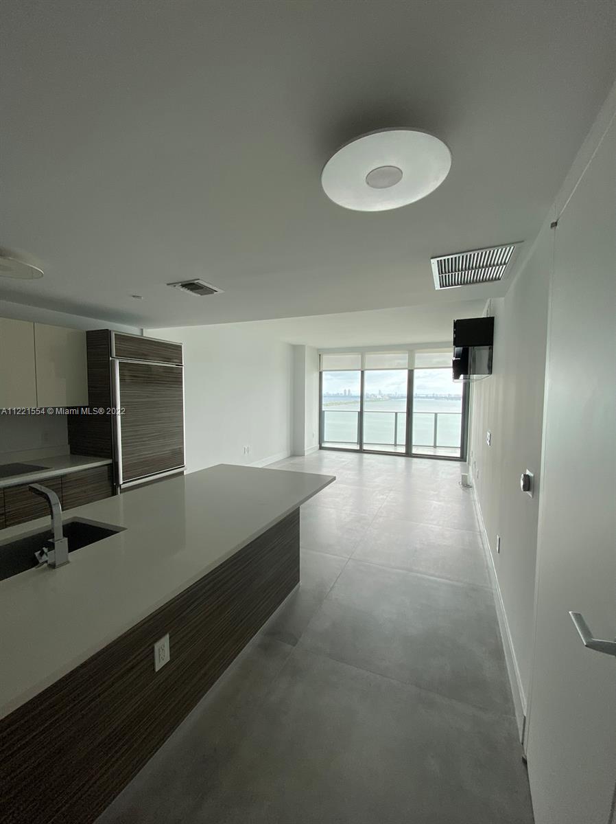 AMAZING 2/2 UNIT IN THE HEART OF EDGEWATER. UNOBSTRUCTED BAY AND OCEAN VIEWS. LOT OF UPGRADES IN THE UNIT. ALL ITALIAN DOORS, CUSTOM ITALIAN CLOSETS AND 2ND BED HAS A BUILT IN ITALIAN CLOSET. ONLY 2 BEDS IN THE BUILDING WITH 2 ASSIGNED PARKINGS NEXT TO ELEVATOR AND FIRST LEVEL OF PARKING. UNIT WONT LAST.