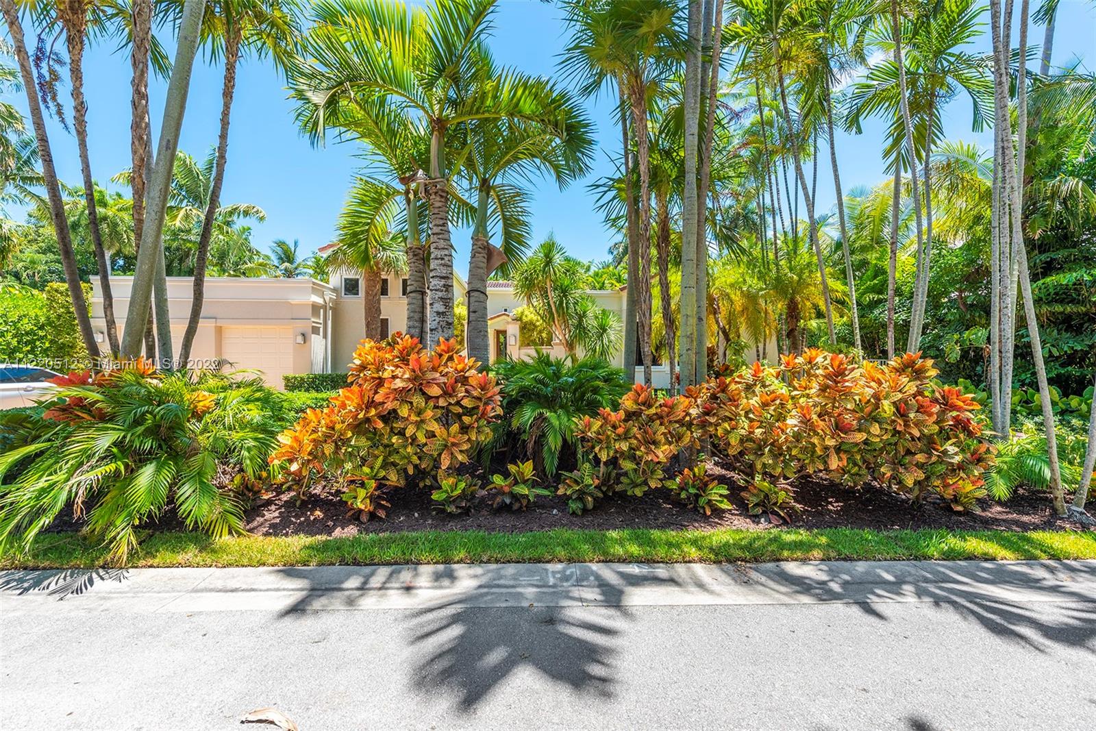 Beautiful single-family home located on Prestigious guard gated Sunset Island II. This one level home was renovated in 2021, has 5 bdrms, 5 baths. Situated on a 12,500 sq ft lot w/ over 4000 Sq. Ft of living space. This home features a newly renovated kitchen with top of the line appliances, quartz countertops, and it's indoor/outdoor flow is perfect for entertaining. Smart home technology. Exterior features include a large driveway, lush backyard with a large heated pool & mature trees with lots of privacy. First time on the market in over 30+ years.