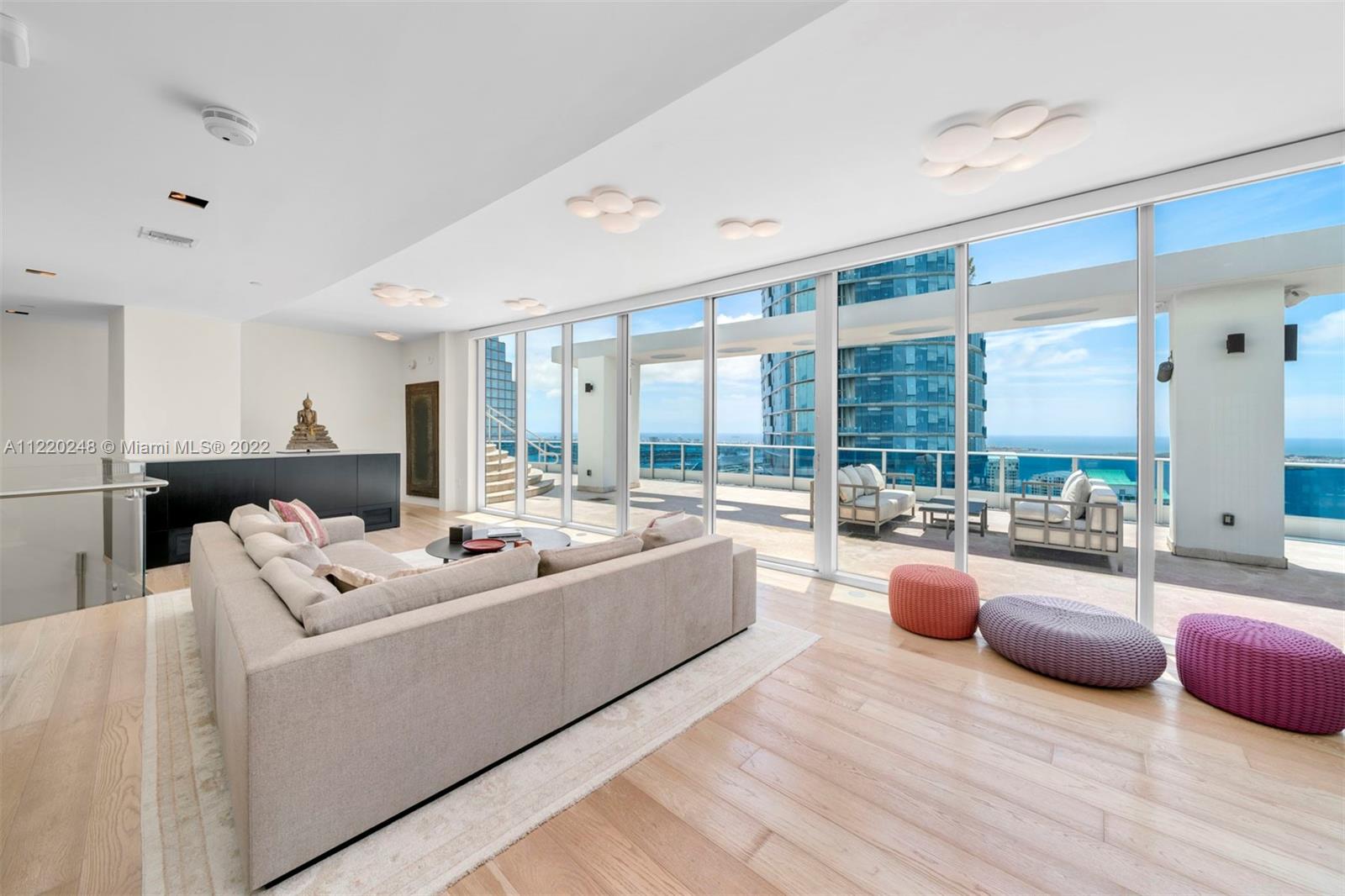 One of a kind 2-story trophy Penthouse in Epic Miami. Perched 54 floors high, enjoy sweeping views of Biscayne Bay, the port of Miami & downtown throughout this contemporary masterpiece. Ideal for indoor & outdoor living with 3,000 sf of expansive terraces, including a top floor entertainment area overlooking your private rooftop jacuzzi. This artfully designed PH boasts 4,310 SF of luxurious finishes with 3 beds/4.5 baths easily convertible to a 4th bedroom. Features include a floating illuminated staircase, open chef’s kitchen, custom closets/doors, & smart home system. Primary suite w/spa-like marble bath, soaking tub, & oversized shower overlooking the bay. Indulge in full-service resident/hotel amenities including multiple pools, gym, spa, concierge, and acclaimed restaurant, Zuma.