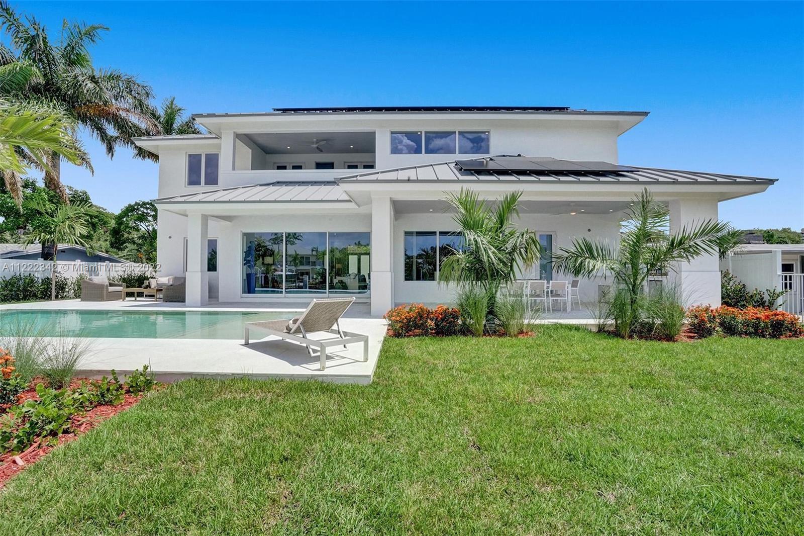 This brand new coastal-inspired Deepwater Estate in Hillsboro Shores has private beach access and a 85'+/- of waterfront.  

This 5 bedroom 5/12 bath + office home offers light-filled open interiors with expansive water views.  The custom Italian kitchen is fitted with top-of-the-line Jennaire appliances and Italian cabinetry.  Outdoor entertaining is a breeze at the resort-style pool with a sun shelf and outdoor kitchen. Sited just off the Intracoastal a brand new, full-service concrete dock offers direct access with no fixed bridges to the ocean via the Hillsboro Inlet and the ocean is just a short cruise away.  

Sustainable and functional; the house is equipped with solar panels, plentiful storage, a pantry/laundry, and a dedicated package delivery room.
