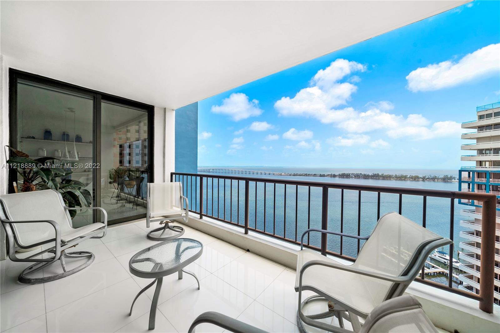 Beautiful residence at Villa Regina in Brickell, with only 3 units per floor and amazing views of Miami & the Bay! Located in the East Wing, this 2 BD / 3BA unit boasts a foyer entry with double doors, gorgeous white  glass tile floors, impact windows & doors, large living room, & separate dining room. The primary suite boasts walk-in closets, his & her bathroom, & stunning views of Brickell. Amenities include a guarded gate, 24-hour concierge & security, pool & Jacuzzi, BBQ area, fully equipped gym w/ sauna & steam room, extra-large party room, & children's playroom—walking distance to Publix, Brickell City Center, Mary Brickell, Metrorail, and St Jude Church. Near Bayside shops, MTX Arena, Adrianne Arsht Performing Arts, Perez & Frost Museums. Boat Slips Available.