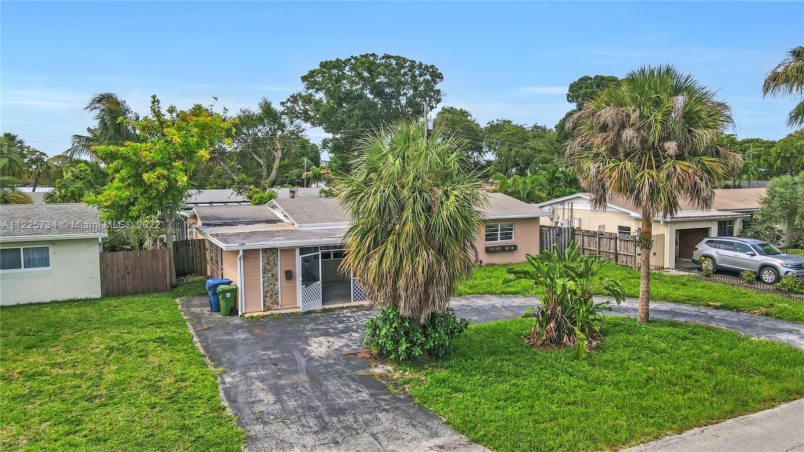 This home is currently under renovation. Located in Central Wilton Manors in a non-HOA neighborhood and within walking distance of Wilton Drive. A large footprint (1,896 SF+ under air) offers many possibilities for a custom design and layout of a buyer's preference. Currently configured as a 4/2; however, an excellent opportunity to re-design into a split floor plan/ open concept home. There is a large circular driveway, screened-in front porch, and room for a pool in the backyard. Home is being sold as-is, cash transactions only, can obtain plans submitted to the city for permitting upon request.