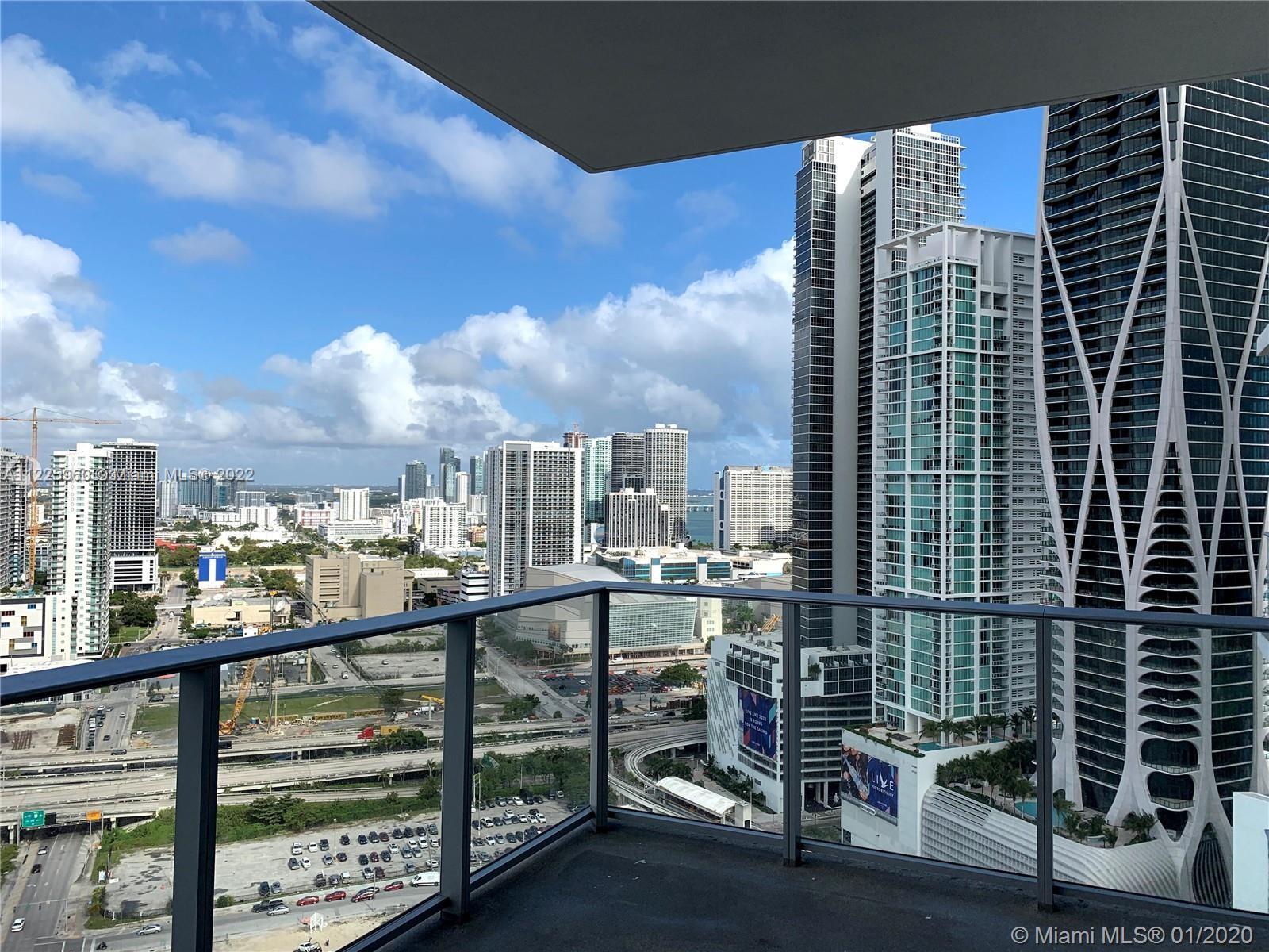 Enjoy Beautiful sunset views of Miami in beautiful 1 bed + Den & 2 full baths. White ceramic floors throughout, Over sized balcony, Valet. Be the 1st to live in the "Most Amenities in the World" building including resort-style pools, spa, yoga studio, incredible gym w/ boxing area with complimentary classes, game room, virtual golf, basketball court, bbq kitchen, racquetball, kids play area & so much more to come soon including a soccer field, tennis courts, jacuzzi overlooking Miami, 56th floor lounge room with Miami Panoramic views, 58 floor skydeck, observatory w/ telescopes to gaze at the stars. Steps from Metro Mover, Virgin Train Station, Port of Miami, AA Arena, Bayside, Museums & Adrienne Arsht Center. Centrally located, minutes from the Airport, Brickell, Wynwood, Miami Beach