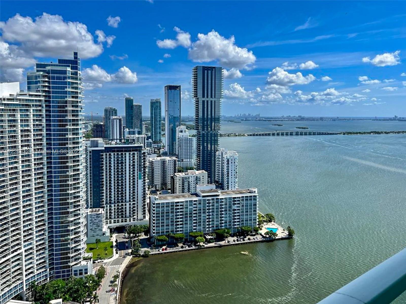 Spectacular high-floor 1Bedroom + DEN and 1BR unit with 2 parking spaces at Quantum on the Bay in Edgewater. Unit has Gorgeous views of Biscayne Bay & Miami  Beach.
Den can be used as a guest bedroom or an office. Building features: 2 pools, state of the art gym, enjoy amazing water views from the Bedroom and Living room. Modern large residents lounge area, theatre room, sauna, valet, convenient store and more...
Beautiful Margaret Pace Park across the street and restaurants just steps away from the building. Close to Downtown Miami, Midtown, Wynwood and .Design District.