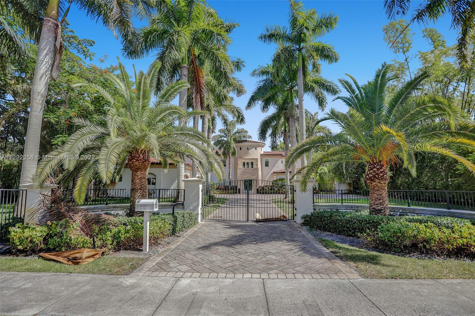 No longer a short sale , REO owned and ready to sell . Gated Mediterranean Mansion in the northern  Pinecrest area better known as Palacio De Las Palmas.7/8.5, two office, two dens & theater room  with over 11,000 sqft  home built in 2012 and on a deep 40,000 lot. master suite that includes 2 large walk-in closets and state of the art spa like bathroom on the first floor, formal living and dining, butlers pantry, elevator, fireplace, separate guest house, 3 car garage with space for a 3 car lifts , service wing including bedroom /bath and laundry facility. Upstairs you are greeted by 4 generous bedrooms all with private bathrooms, second family room, sprawling outdoor terraces with salt water heated pool as well as plenty of fruit trees makes this a great opportunity .