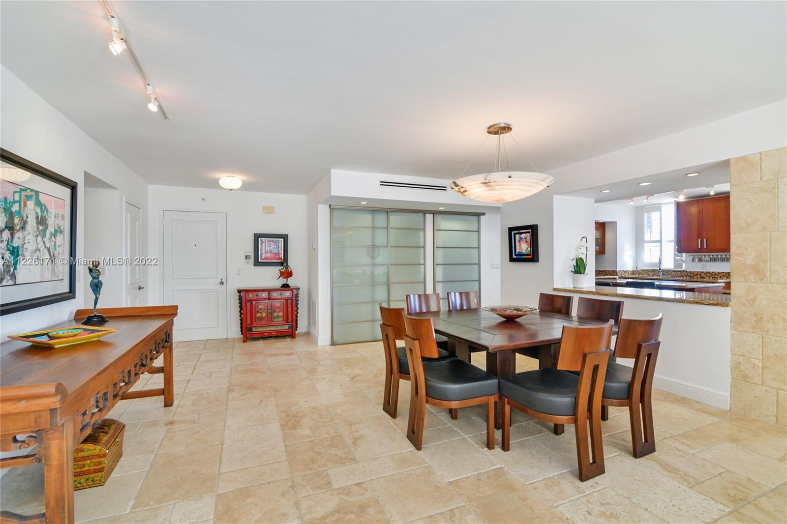 Looking the entrance door Dinning-room and open kitchen