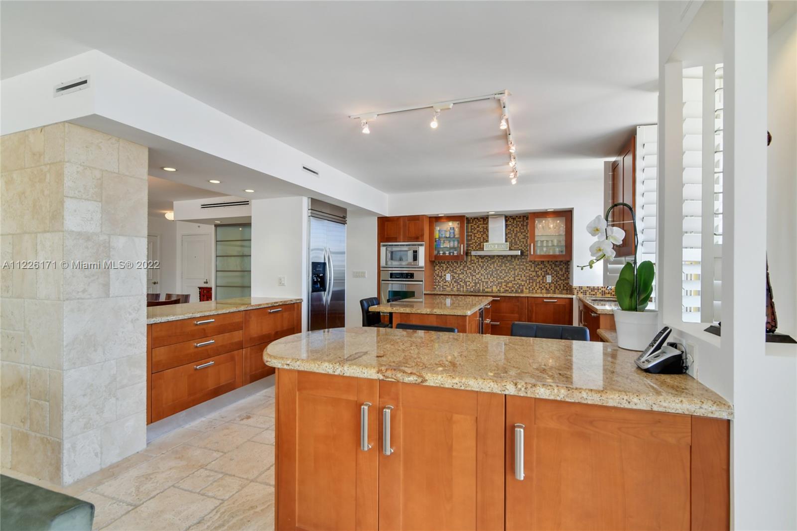 Kitchen with breakfast area and island