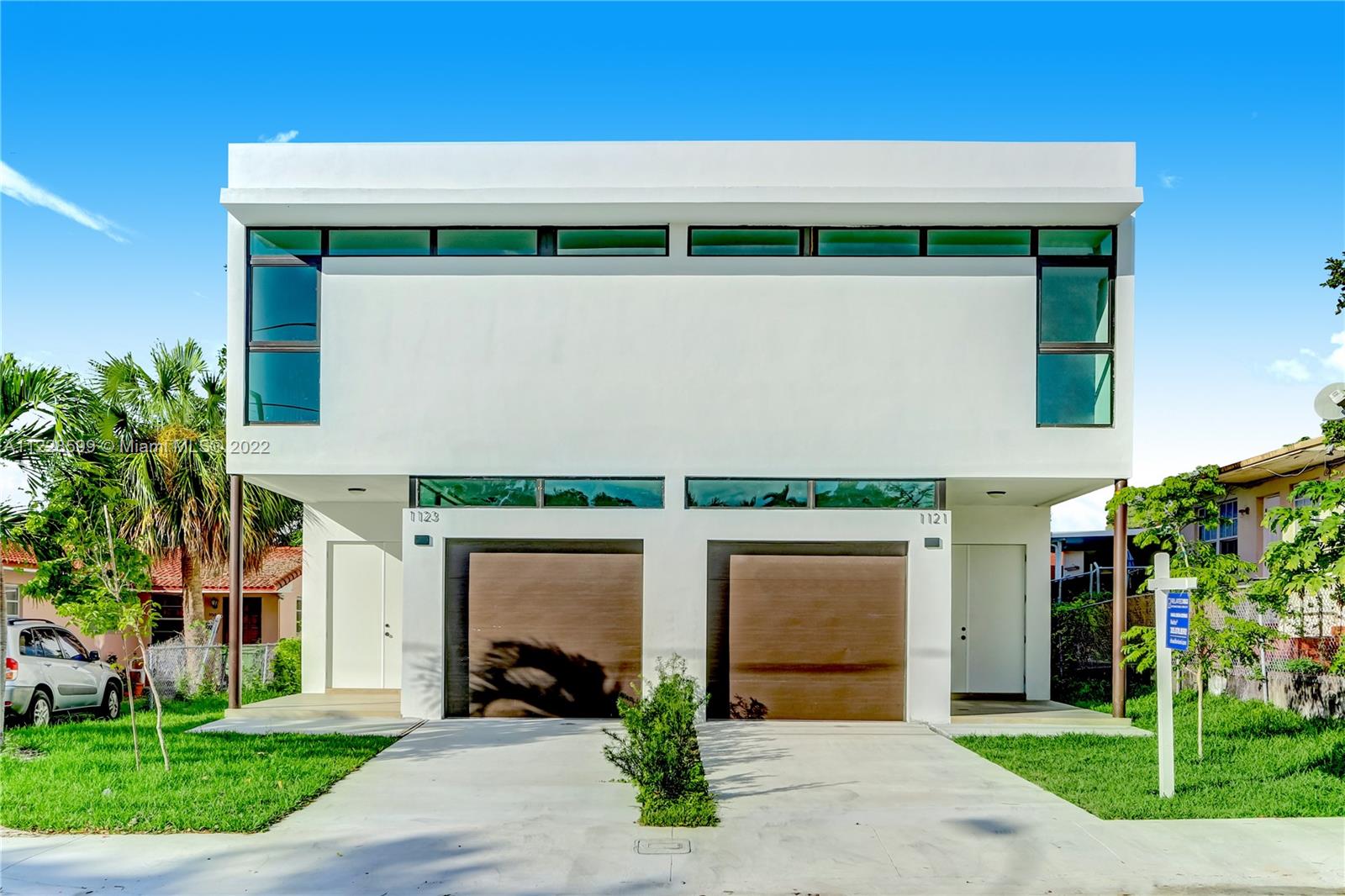 Be the first to live in this new Construction Modern Masterpiece ideally located right off the Roads, within 5 minutes of Brickell and 15 minutes from Coral Gables. This 4 Bedroom, 3.5 Bathroom home boasts 2,840 SqFt of living space with high ceilings, impact windows and endless natural light upon entry. The first floor features an open floor plan concept with a formal dining room that could be used as a den, a large living area with a direct access to the backyard, a chef's kitchen with eat-in bar and a seamless flow between the indoor and outdoor spaces. The 4 bedrooms are conveniently located on the second floor. The master suite includes a tub, oversized shower and walk in closet. Property is fenced and has an electric gate. No Association. Seller is willing to build a pool.