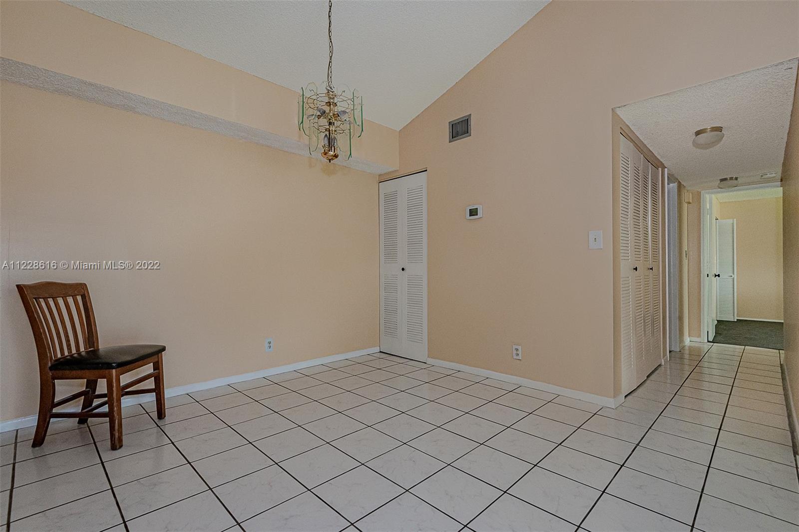 The hallway is back to the 2 bedrooms, laundry, and both bathrooms.