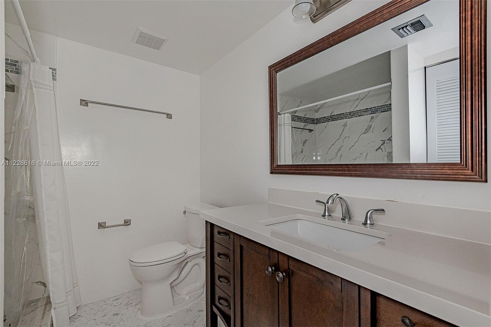 The Master bathroom with quartz countertop on the vanity.