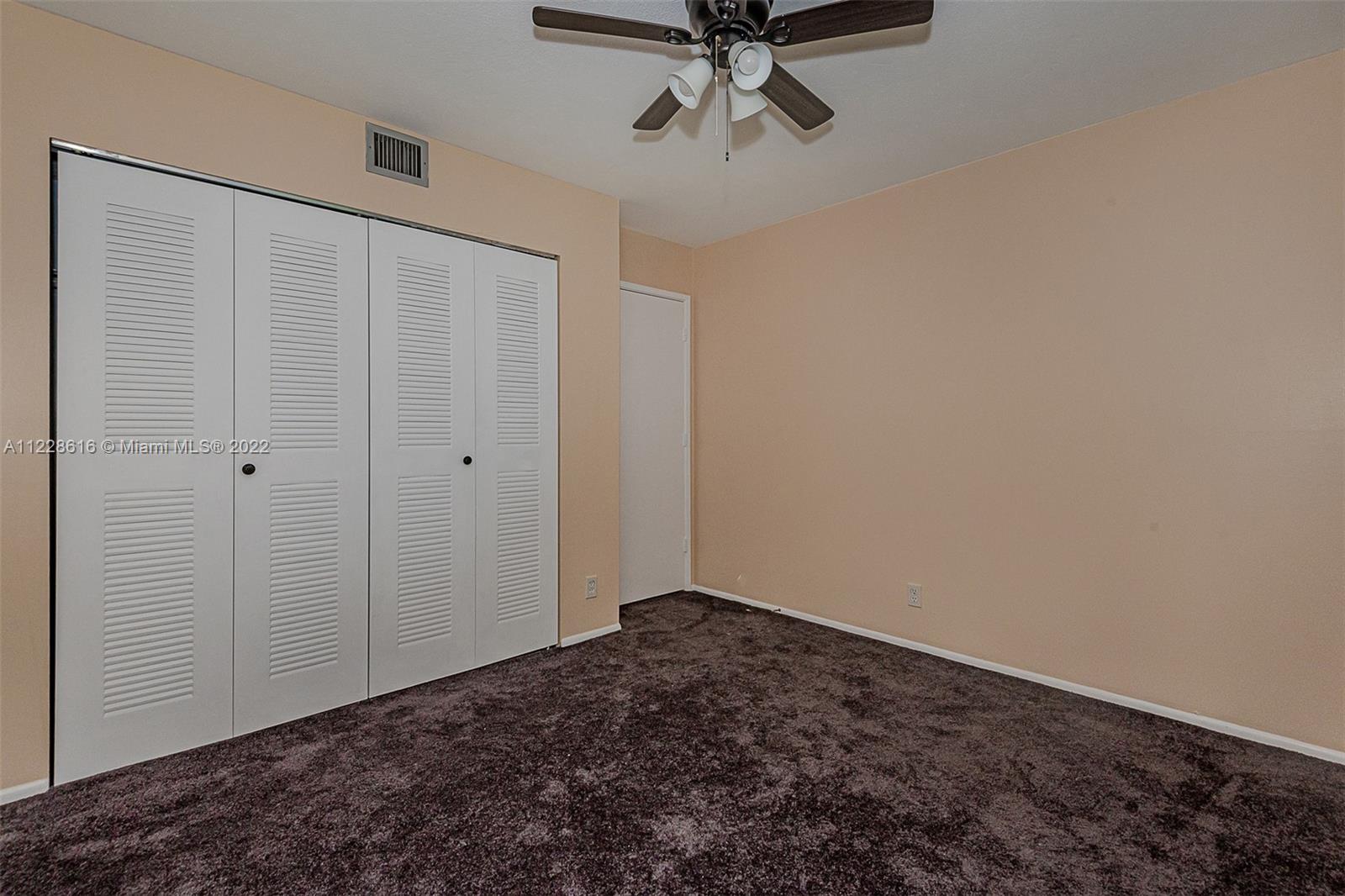 The 2nd bedroom has a large side by side closet.