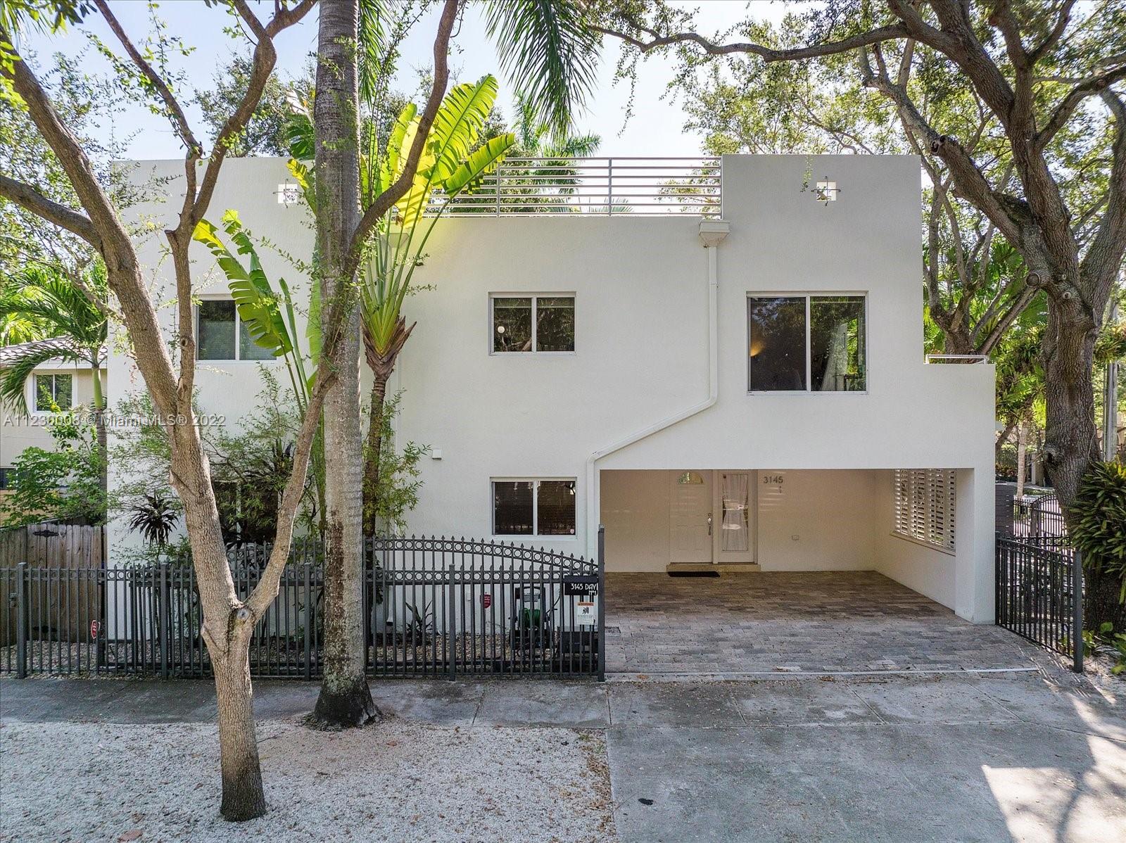 BEAUTIFUL FIRST FLOOR UNIT IN DESIRABLE COCONUT GROVE!  UNIT HAS GRANITE COUNTERS, STAINLESS STEEL KITCHEN APPLIANCES, MARBLE FLOORING AND MORE!  GATED PROPERTY WITH CARPORT FOR TWO CARS.  WALKING DISTANCE TO GROVE TENNIS COURTS, RESTAURANTS, STORES AND THEATERS.