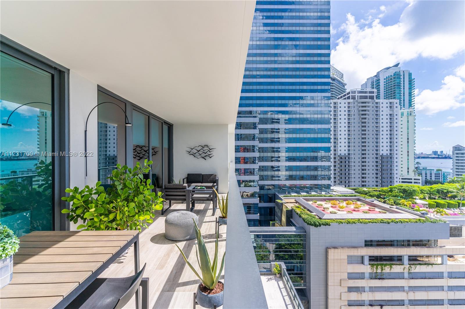 This boutique residential high rise is the most exclusive building in Brickell designed by world renowned architect Carlos Ott. Located in the epicenter of Miami's fastest growing metropolitan neighborhood, on the East side of Brickell Ave. Fully furnished -turnkey unit. Exquisitely designed. White oak wood floor. Breathtaking bay and city views, incredible sunrise from the expansive 281 sq.ft. terrace with summer kitchen that brings the outside in. Italian glass cabinetry, exquisite marble countertops and top-of-the-line Subzero, Wolf and Bosch appliances. Apple home technology, robotic parking system, infinity-edge pool, state-of-the-art gym, and spa deck with panoramic views of Biscayne Bay and Downtown Miami. 24 hour Valet, Security & concierge.