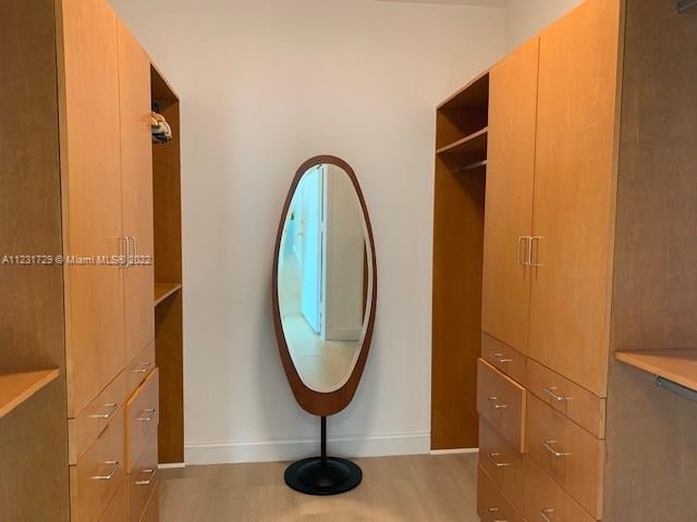 Master Walk-in Closet (His)