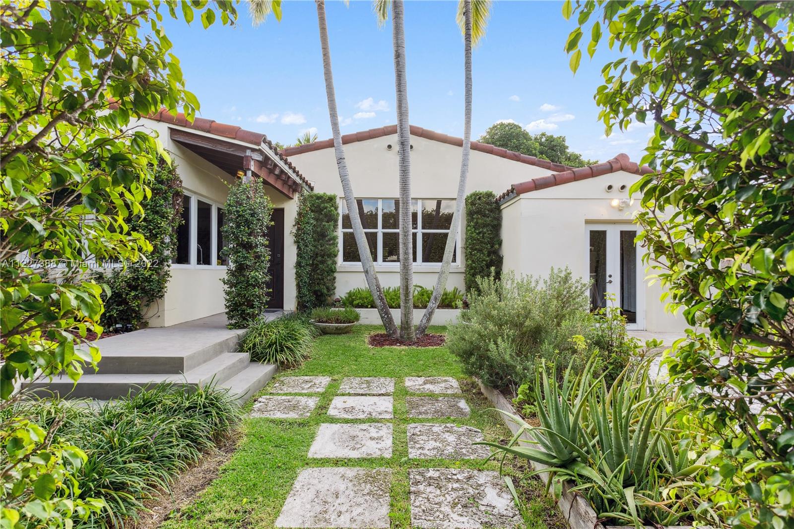 Exquisite Spanish style home in quiet and desirable Post Ave, in the heart of Miami Beach. Beautiful wood vaulted ceiling, open kitchen, wood floors, and split-floorpan providing privacy and functionality. Very bright 3 bedroom plus den with a magical backyard boasting a large pool and a flower filled cedar Pergola to dine under. Temperature controlled wine room with space for 72 bottles, gas generator. Very private with 13' tall Ficus surrounding the perimeter of the house. The mud room and the original details along with the modern feel and original crown moldings, make of this home a true gem and quintessential Miami Beach. SEE BROKER REMARKS!!