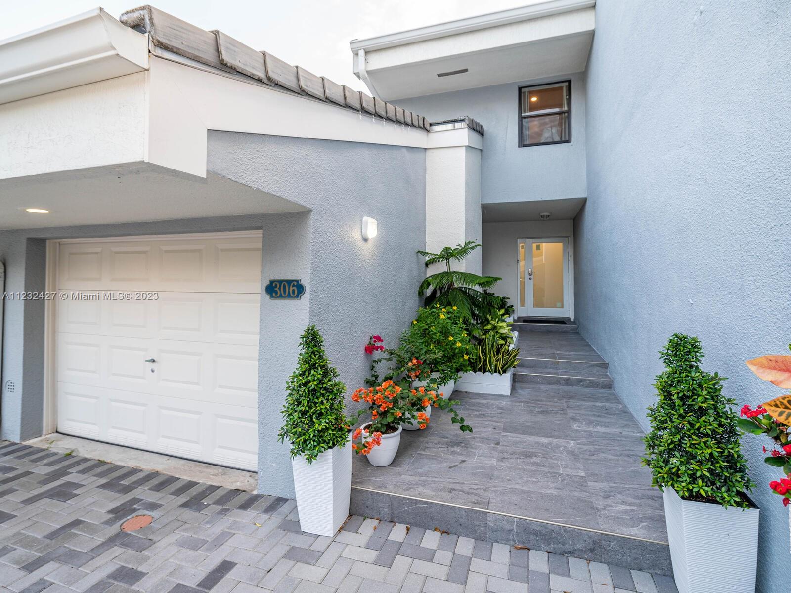 Rarely available townhouse with finger pier dock for boat lovers!  Enjoy living n the heart of Sunny Isles in Private Community across from the ocean with 1.5 miles boardwalk around the private isle. 3 bedroom plus office, 2.5 bath upgraded unit with new kitchen, stainless still appliances, skylight, new washer & dryer, a lot of closet space. Gated community has 2 large pools, 4 tennis courts, basketball court, jacuzzi, gym, 24 hours security, unlimited guest parking. Across from the ocean, walking distance to synagogue, all shops, restaurants, medical offices, minutes to Aventura Mall Bal Harbour shops & Golfstream Casino. Unit comes with the largest possible new finger pier dock for 31' boat. Pet friendly community with no weight restriction. Tenant occupied until February 28, 2023.