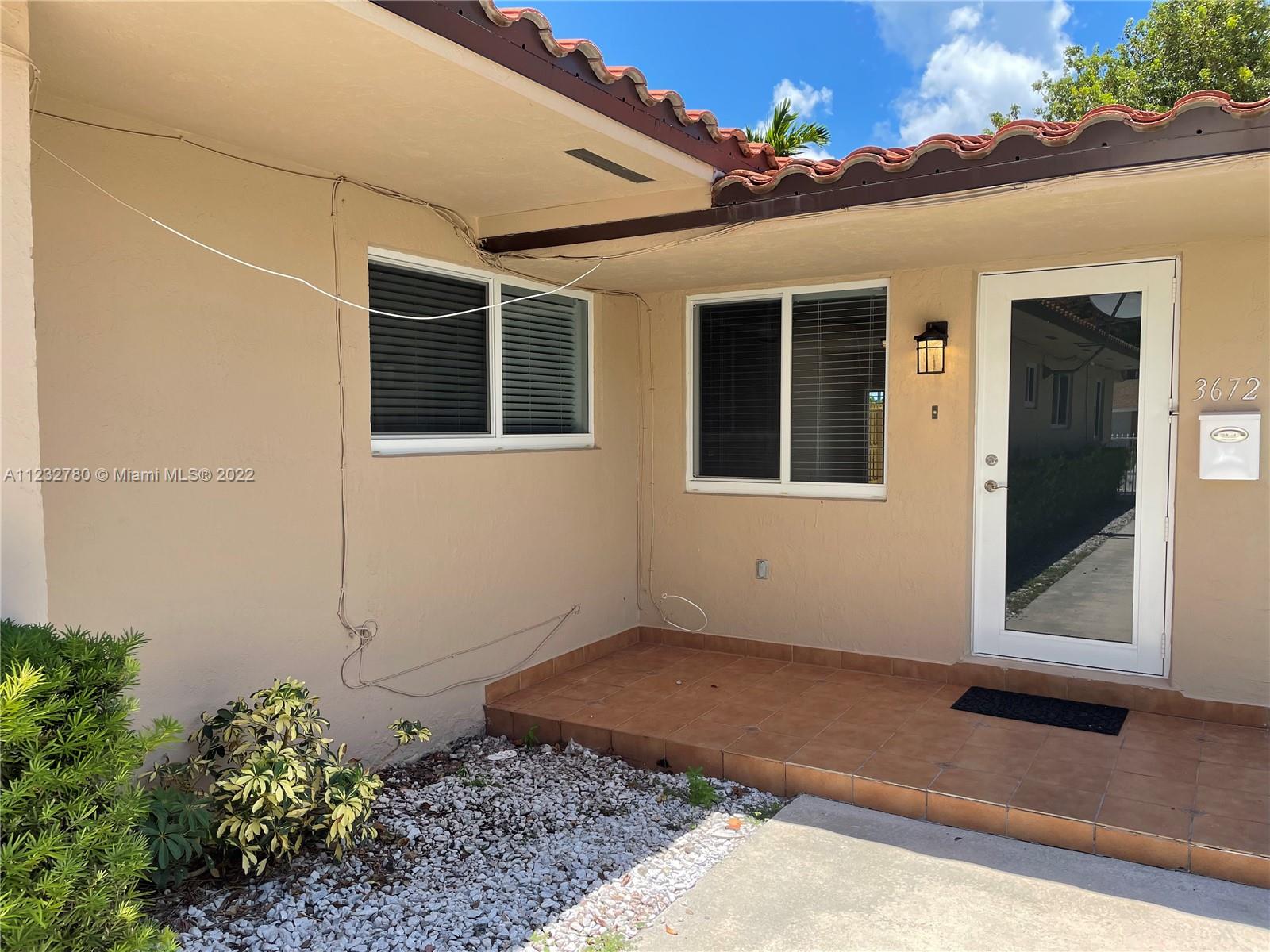 Updated, one level twin home, conveniently located between Coconut Grove and Coral Gables. Low traffic, No Outlet street! Tile floors through out. Newer roof in the past 5 years. Newer impact doors and windows. Open floor plan. Functional kitchen with wood cabinets and granite countertops. Newer appliances. Separate laundry room with lots of storage. Large master suite with walk in closet. Two more nice size rooms share the second full bathroom. Deep driveway can accommodate multiple cars. Large fenced in back yard. No neighbors in the back!!! Direct access to The Douglas Park from backyard which has basketball & tennis courts, children's playground, walking, running and biking path, lots of green space. No maintenance fee. Each owner pay for their own insurance and expenses.