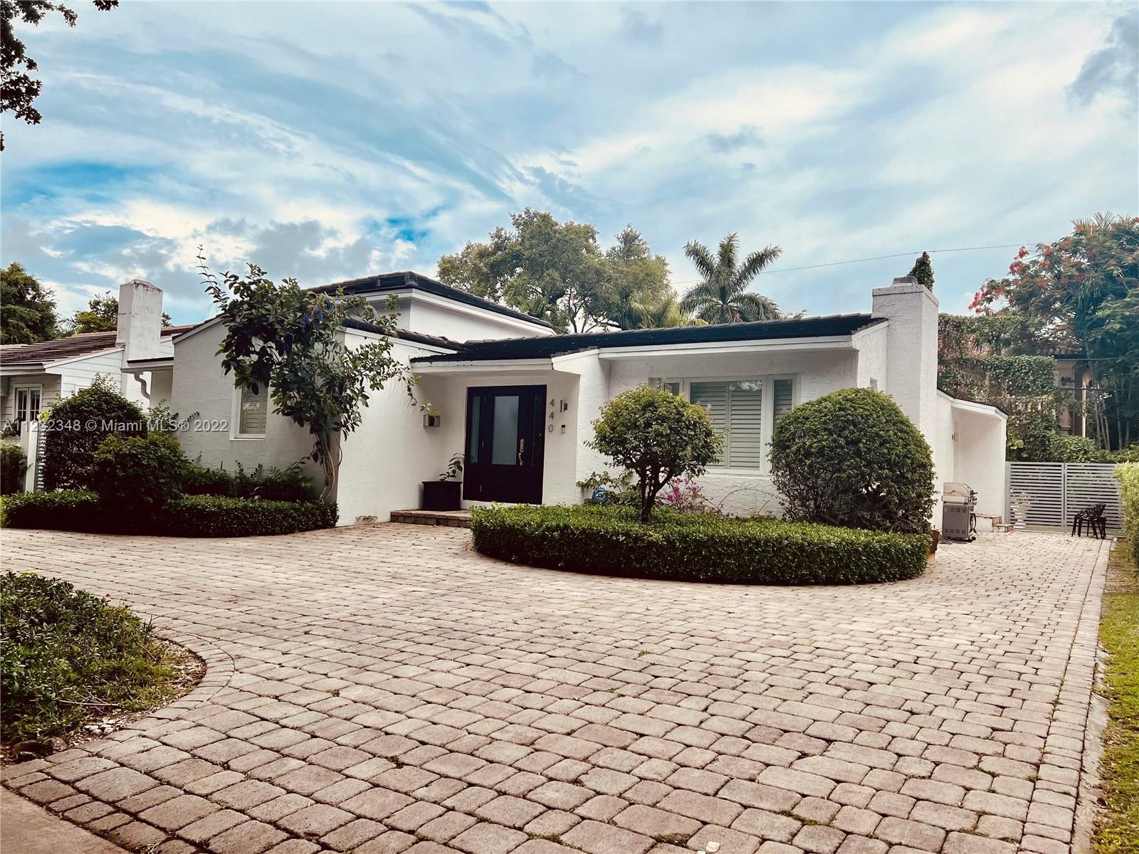 This Coral Gables Charming home is truly a must see! 3 bed/2.5 baths in a beautiful charming tree hugging road(Zamora). This 1940s home has recently been updated, boasting of new construction (880) additional adj sq feet approved & permitted by the City of Coral Gables, a new roof (2020) all updated appliances & even a freestanding tub.  Impact windows and doors throughout home as well as plantation shutters for the same.  Plenty of space for a large pool or just backyard gatherings.  New Master bedroom includes a beautiful loft and a walk-in closet, that promises to be the envy of all your friends.  Master bedroom also includes a laundry room with a side pool bathroom with access to the backyard.  And Lastly, in Coral Gables fashion, a working fireplace to enjoy amongst family & friends.