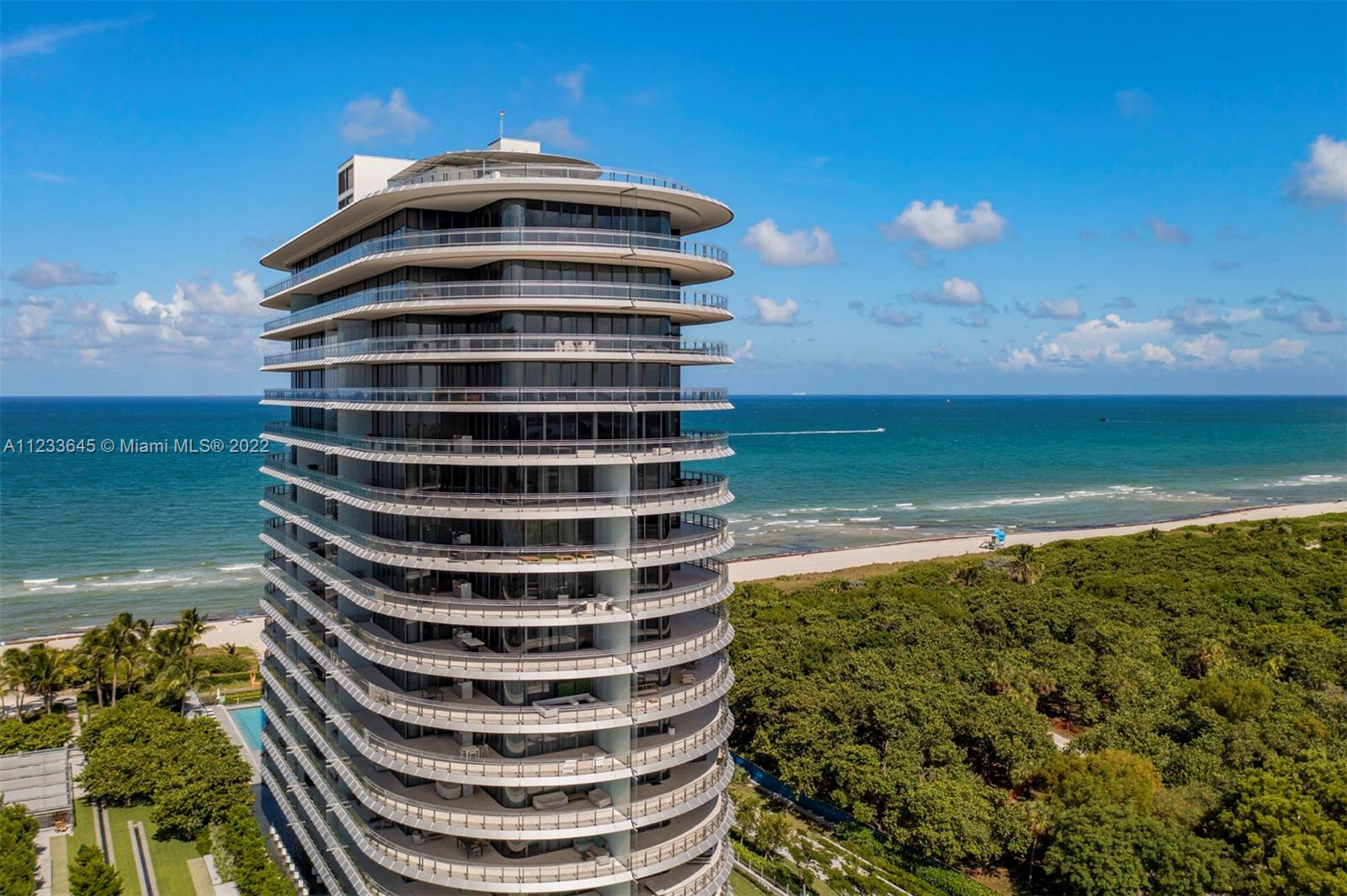 One of Miami Beach's most unique buildings, Eighty Seven Park, was designed by renowned architect Renzo Piano Building Workshop. Enjoy resort-style living in this tranquil space overlooking Biscayne Bay and Miami skyline views to the West and the endless Atlantic Ocean to the East. This corner unit features high-end finishes, floor-to-ceiling walls of glass, and stacking glass doors which create a seamless indoor/outdoor living space on the 1,433 square foot terrace. Interior features, such as a private elevator entrance, chef's kitchen, Subzero and Wolf appliances, and custom D & C Italia closets with LED lights. The building features 5-star services including a full-service spa and hammam, hair salon, board room, 2 pools and beach service, FUGO restaurant, Enoteca Wine Bar, and more.