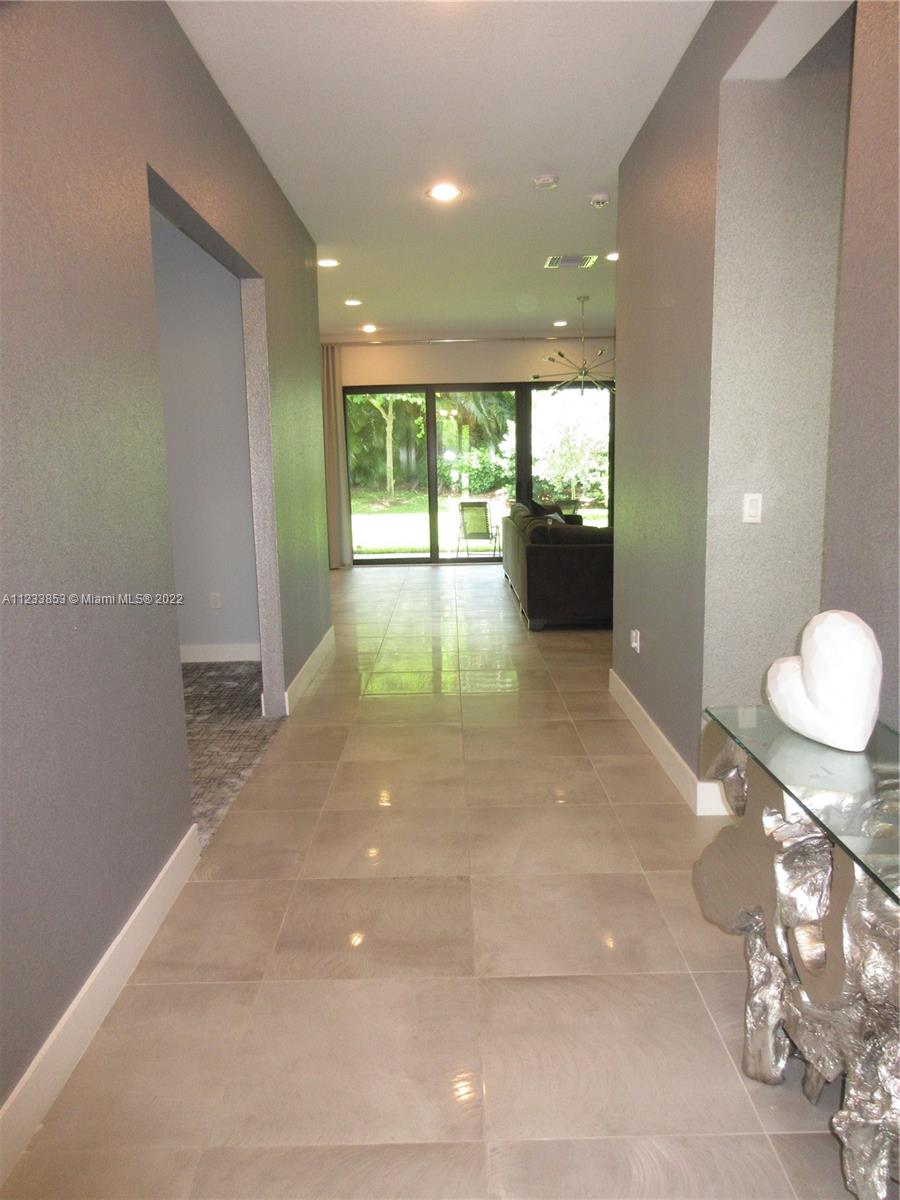 Entry way with designer wall treatments