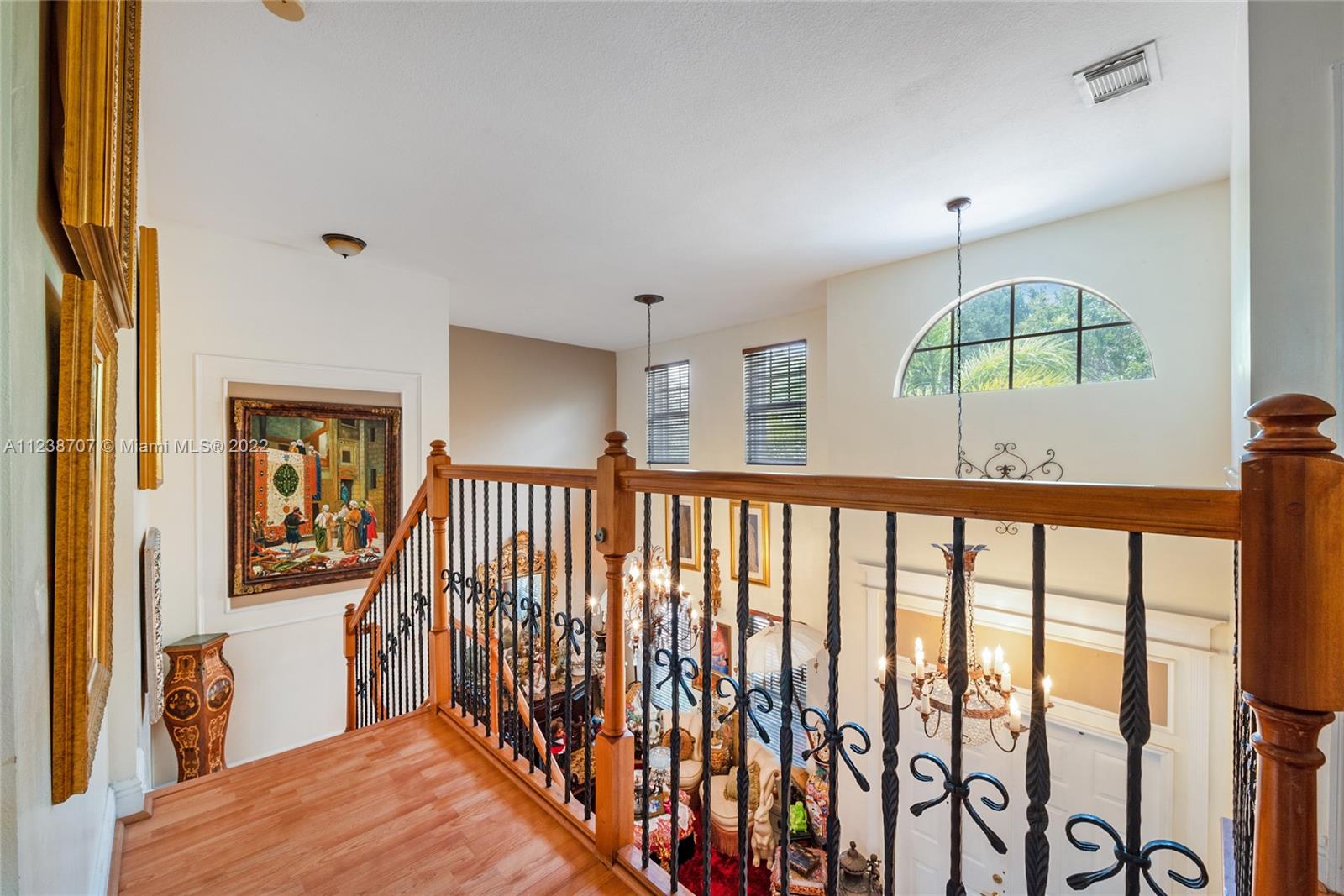 not staged image of the not staged image of the second floor hallway/ top of the stairs view