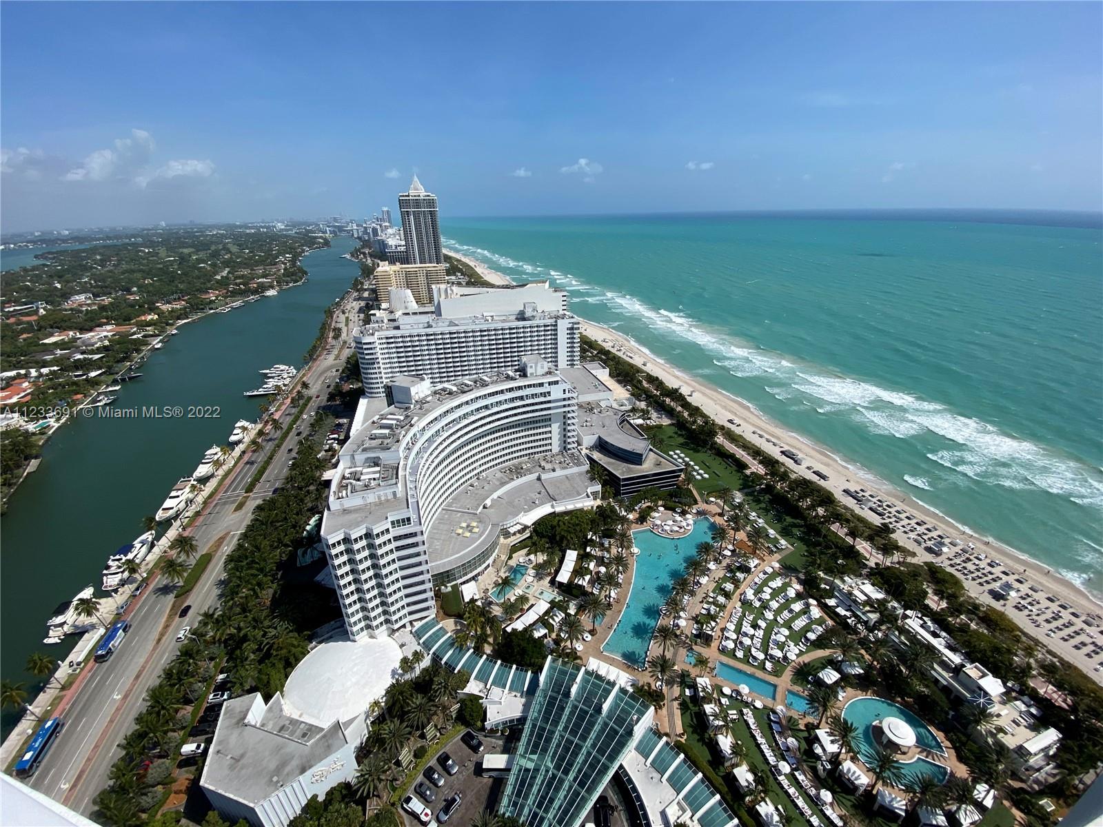 Once in a lifetime opportunity to own one or both penthouses at the iconic Fontainebleau.  The views of the Atlantic ocean, Miami beach, Biscayne Bay & the Miami skyline are simply spectacular.  This is living on a grand scale w 4500 SF interior & a massive, surrounding ter of 3300 SF w spa & shower.  The 5BD + 5BA + 2 1/2 BA unit comes fully furnished.  The great room w volume ceiling, soaring windows & the open kitchen make this PH the perfect resort-style home.  Keep a yacht at the Marina.  Elec, AC, wifi & valet included in the HOA.  The Benefit Program offers discounts on the hotel amenities such as the Lapis Spa & Hakkasan.   The Rental Program provides worry-free ownership & no rental restrictions.   PH rental demand will increase w the 50,000SF event center completion in 2025.