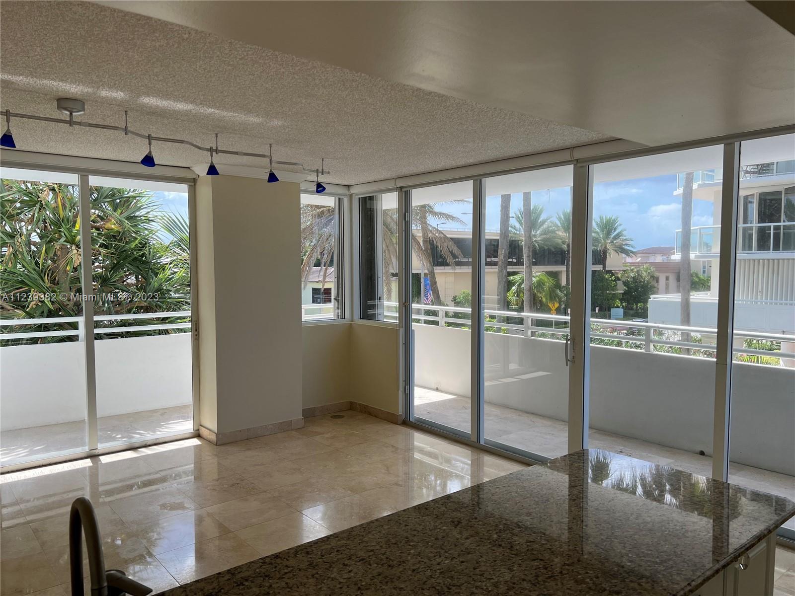 Living Room with Sliding Glass Doors plus Views