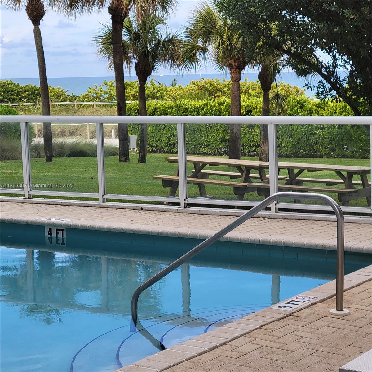 Swimming Pool with Yard Table to Eat & Relax