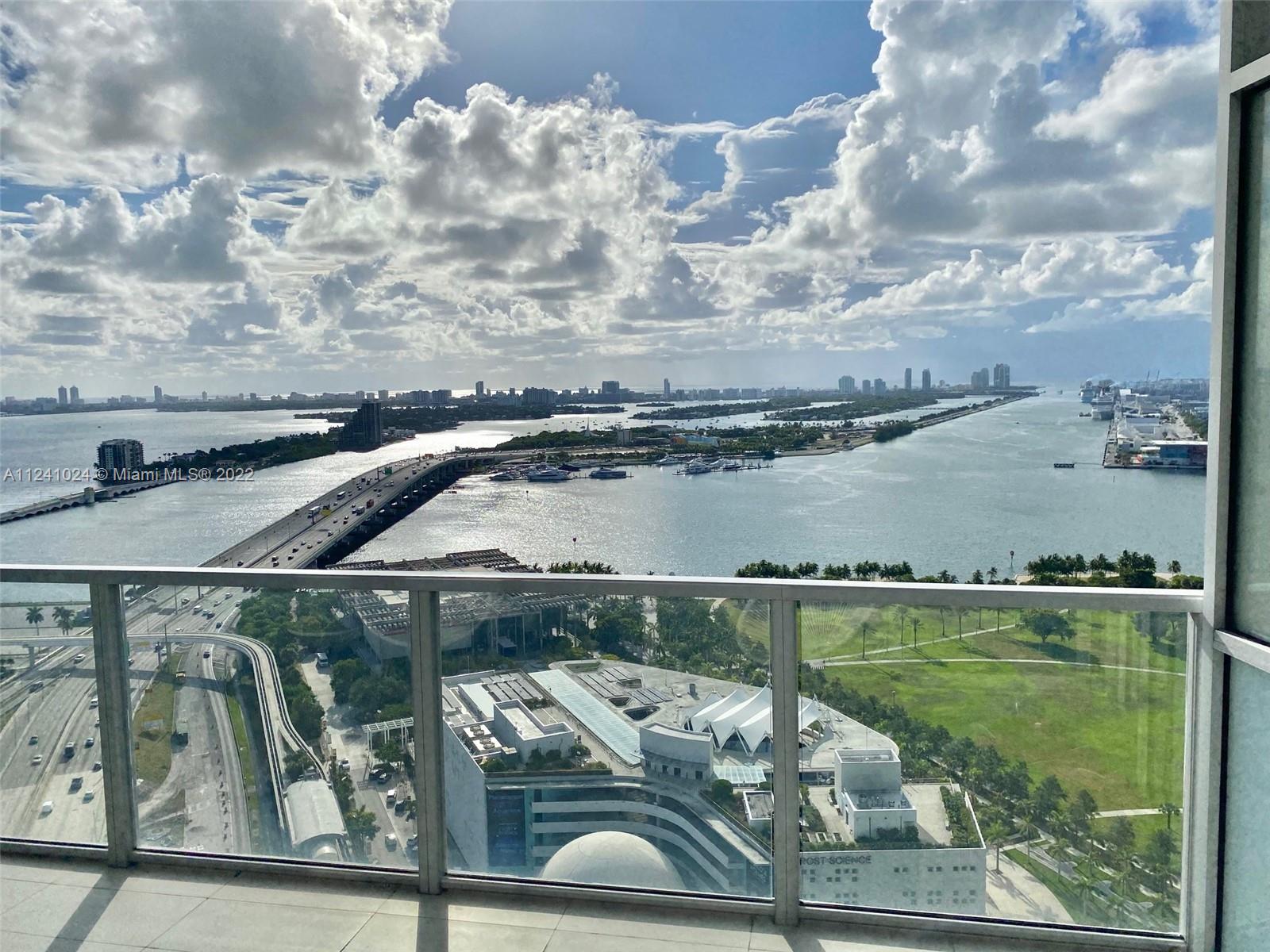 Modern 2-story Loft style 1Bdr + Den | 2 Bath in luxury building. Den closed and used as an office. Unobstructed views of Biscayne Bay- Port of Miami. 20" high ceilings and oversized balcony. Railing was updated to Glass on 2nd floor & stairs. Top of the line appliances, 5 star amenities including Valet, 24hr doorman, lounge, Sky Pool Deck & Spa. Rented until 08/20/23.