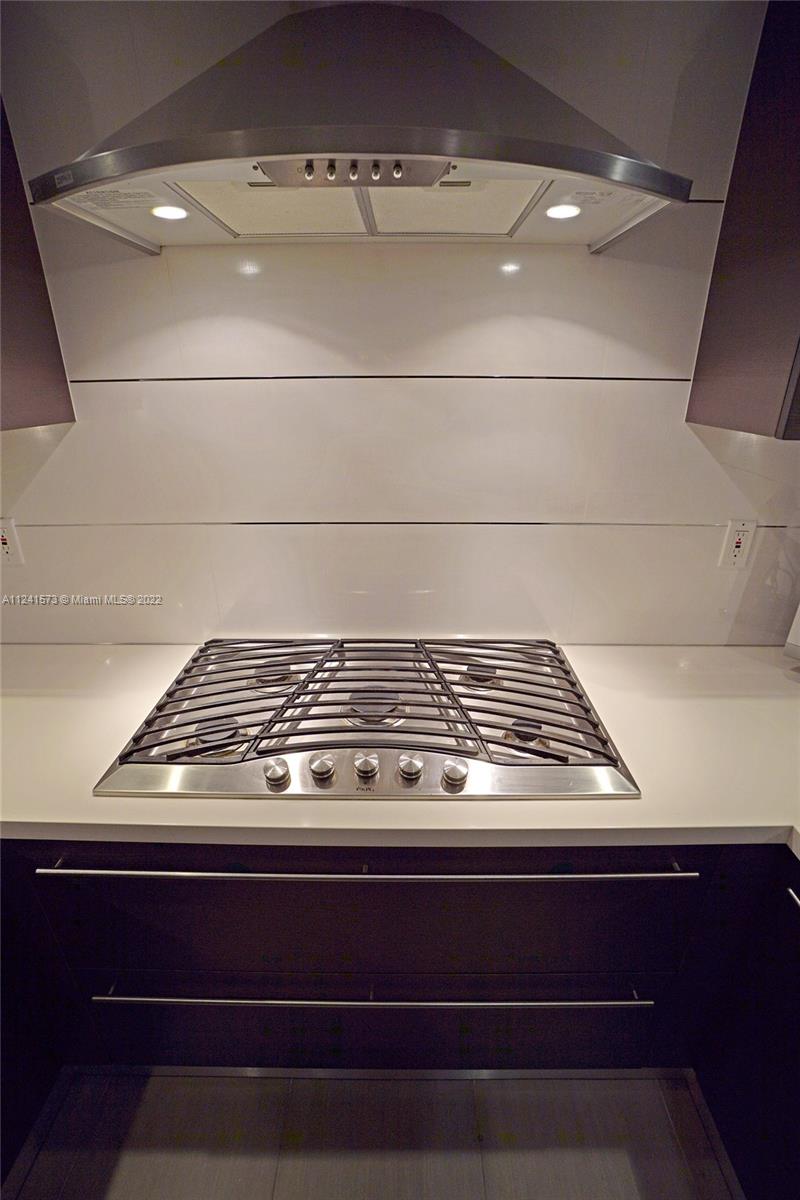 Gas stainless steal kitchen stove.