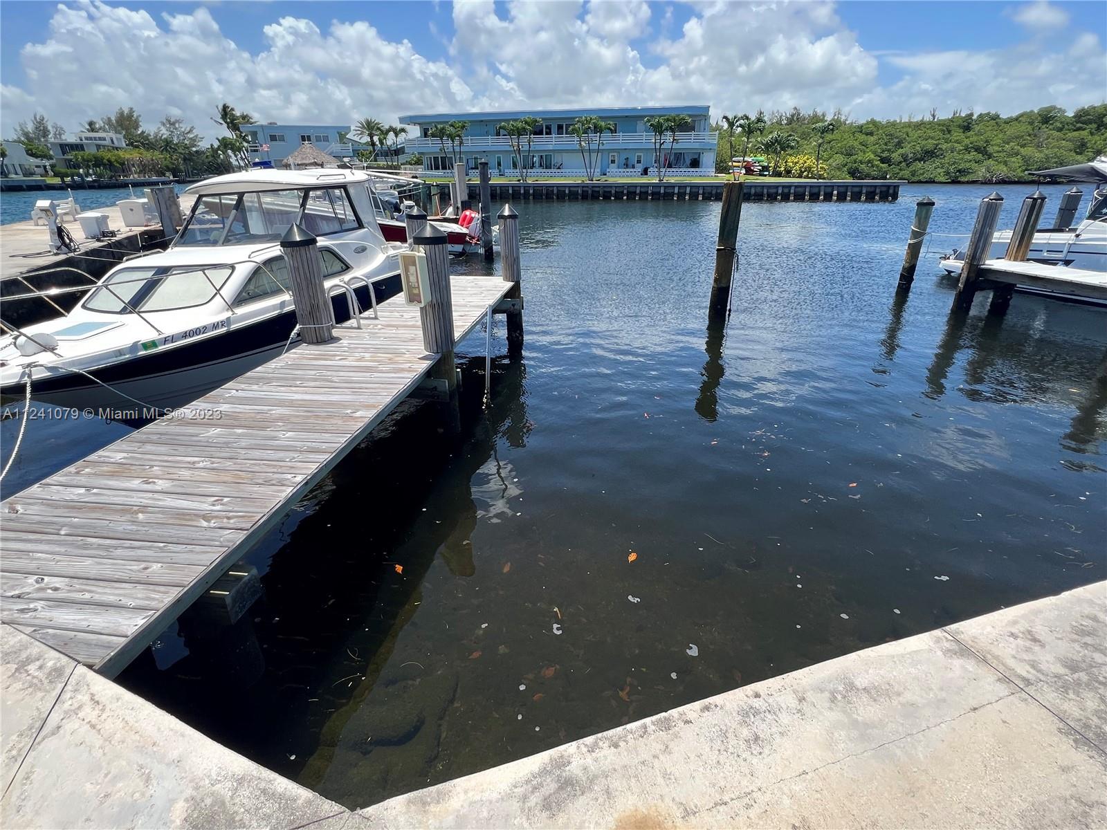 30' DOCK SLIP WITH POWER AND WATER INCLUDED