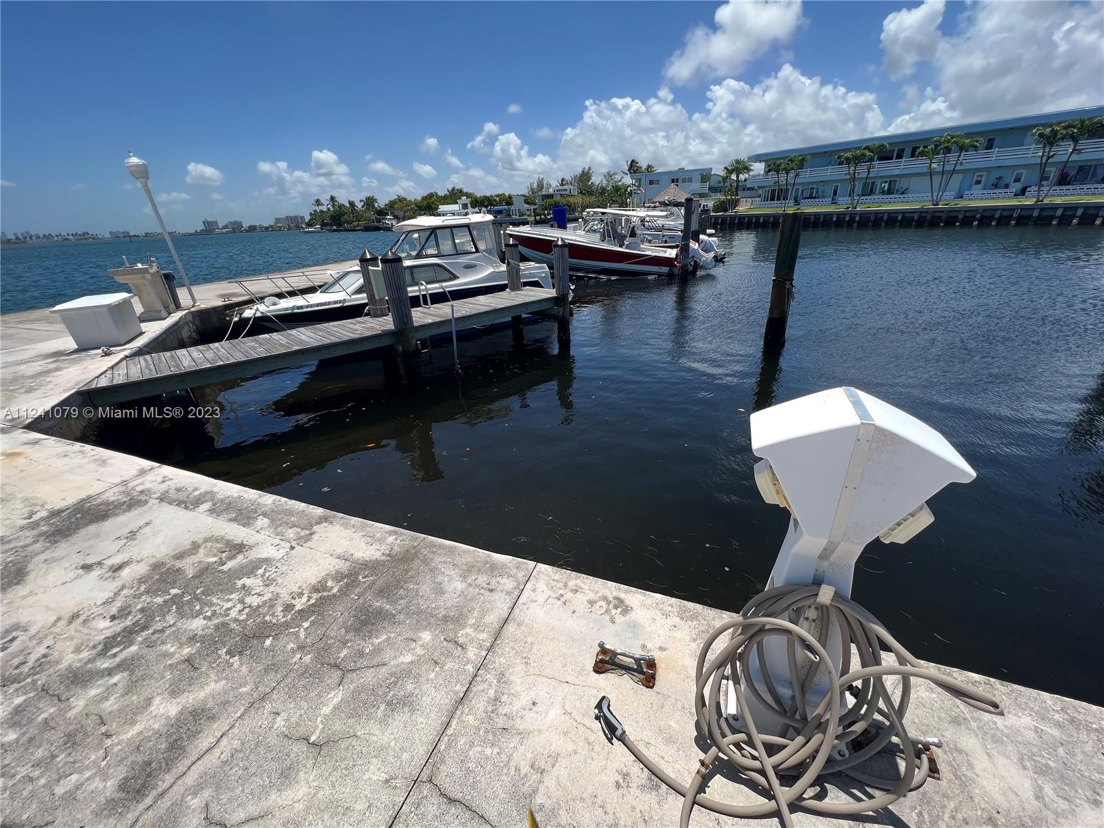 30' DOCK SLIP WITH POWER AND WATER INCLUDED