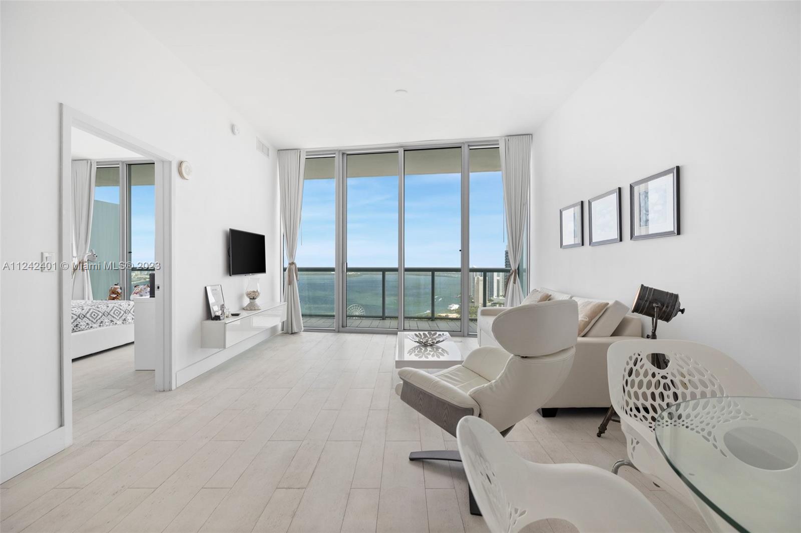 Spectacular 1 Bedroom and 1.5 Bath unit at the MarinaBlue. Enjoy stunning breathtaking panoramic views of Biscayne Bay, Ocean and the Downtown Miami skyline. Unit offers floor to ceiling impact windows with marble and ceramic floors, large balcony, open kitchen with stainless steel appliances and granite countertops. Luxury amenities include 2 pools, Hot Tub, Fitness Center, volleyball, business center, convenience market and more. Just minutes from South Beach, Adrienne Arsht Center, Perez Museum, Wynwood, Design District, Brickell and Midtown. Metro-mover conveniently close. Extra storage on 9th floor. Downtown Miami Living at its finest.