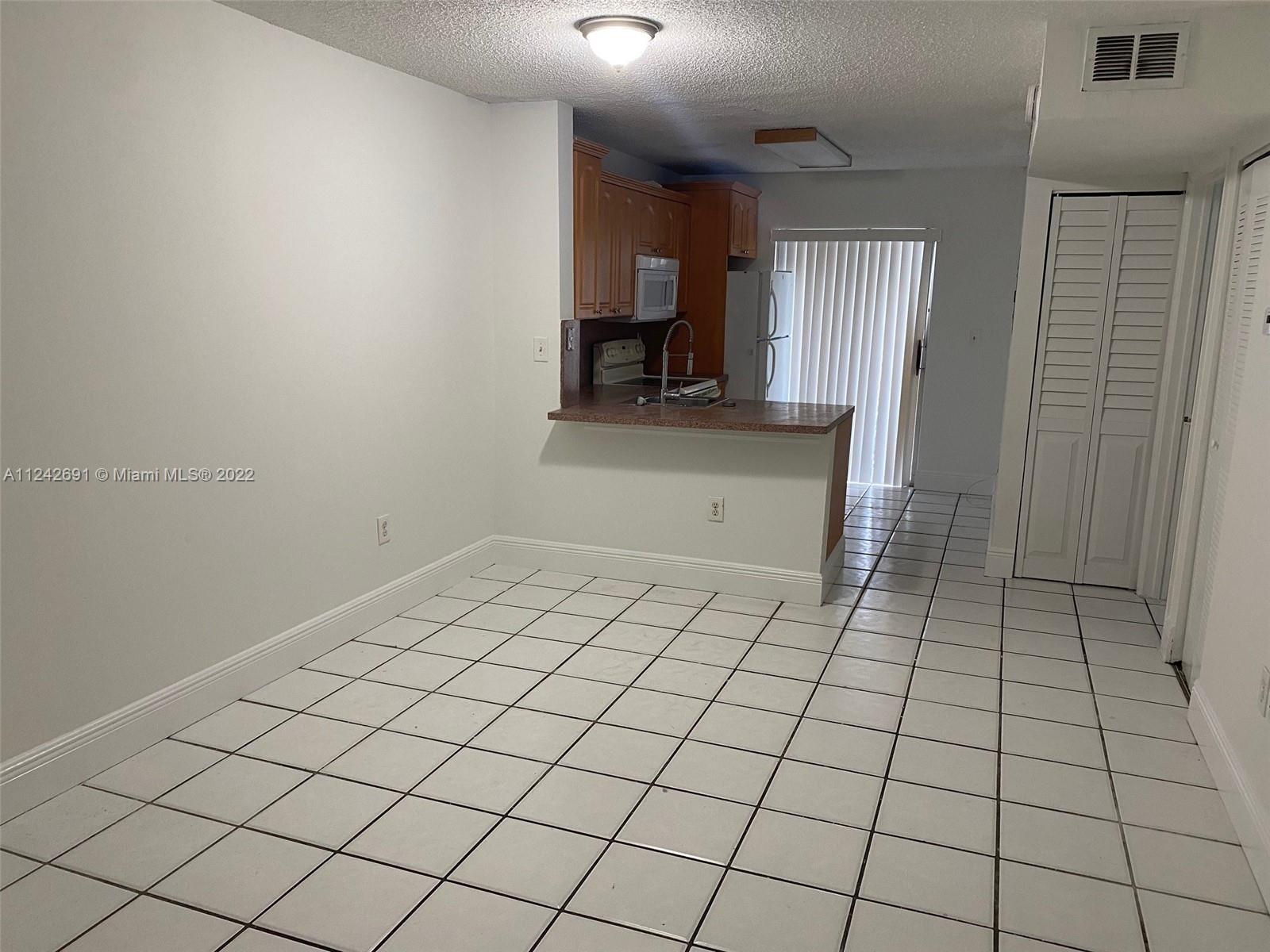 Location, location! Excellent layout for a 2 bed, 2 bath unit located on the first floor. Washer/Dryer inside the unit, freshly painted, and refinished bath tubs. Ready for move-in or great investment property.