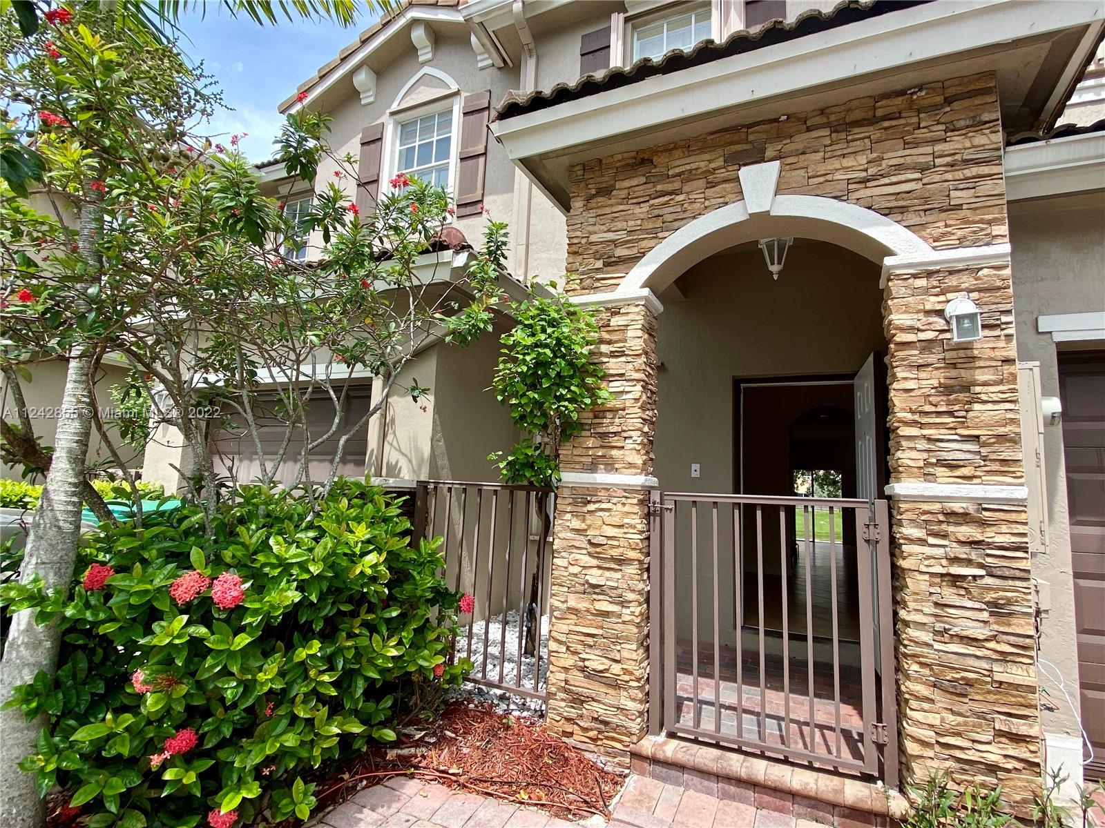 Beautiful 3 bed 2 1/2 bath townhouse with patio and peaceful lakeviews. Perfect layout. 2 parking spaces + garage. Very pleasant gated community with beautiful pool, large fitness center, playground in Cutler Bay. Perfectly maintained. Close to shopping and entertainment.