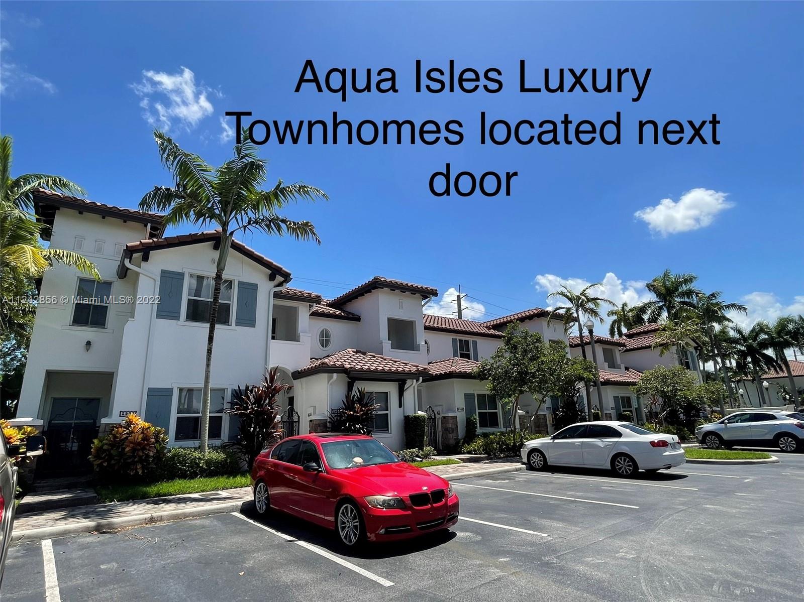 Aqua Isles Luxury Townhomes next door